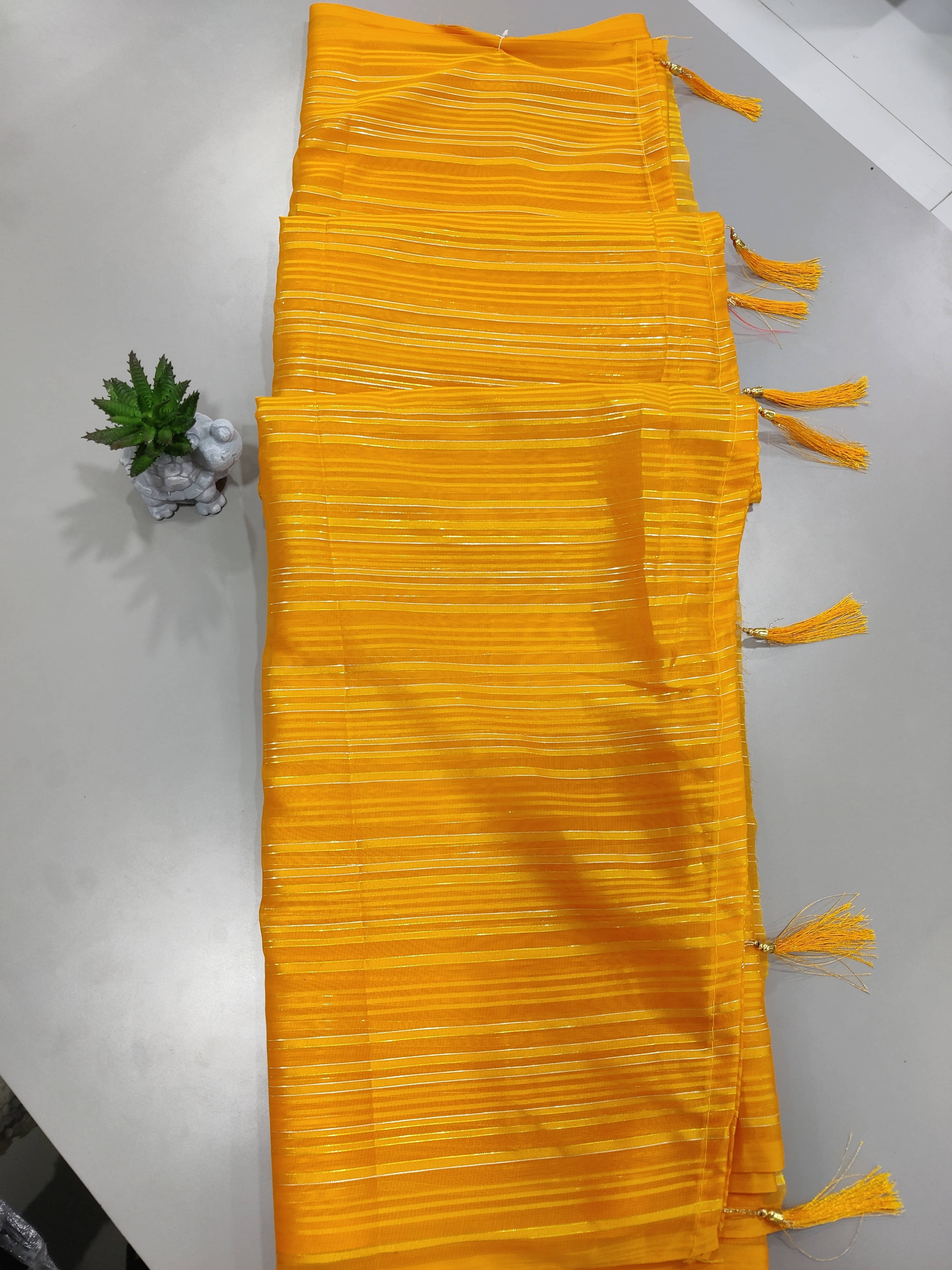     			VRAGI Chiffon Striped Regular Saree With Unstitched Blouse Piece ( Mustard )