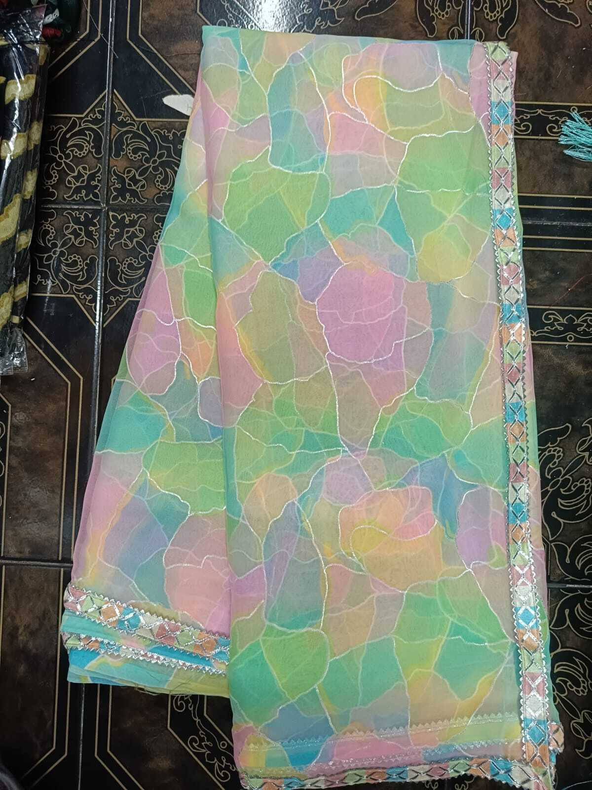     			VRAGI Georgette Printed Regular Saree With Unstitched Blouse Piece ( Multicolor )