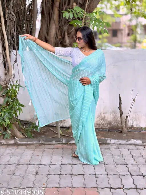 VRAGI Georgette Striped Regular Saree With Unstitched Blouse Piece ( Blue ) VRAGI Georgette Striped Regular Saree With Unstitched Blouse Piece ( Blue )