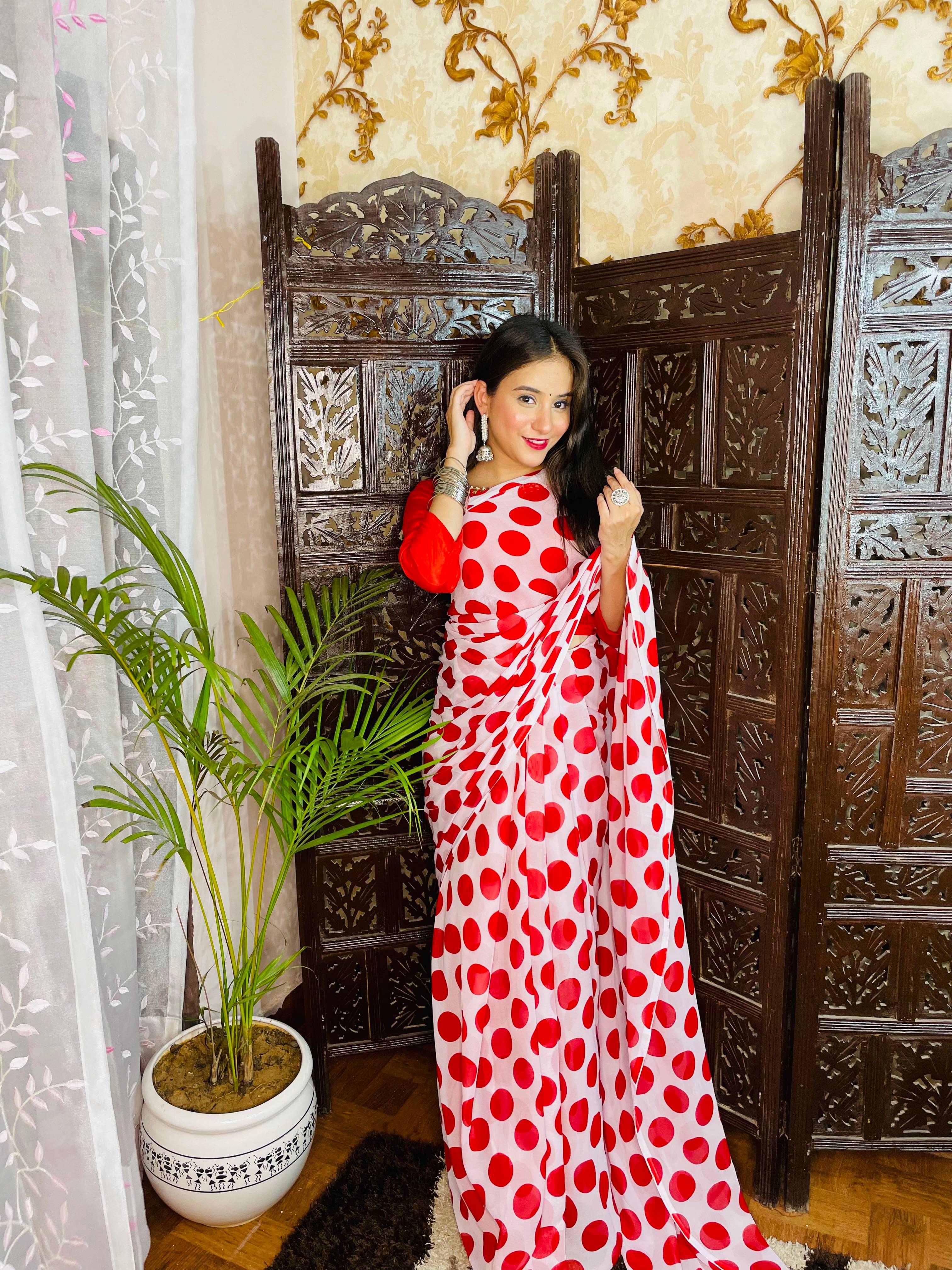 ANAND SAREES Georgette Printed Kasavu Saree With Unstitched Blouse Piece ( RED ) ANAND SAREES Georgette Printed Kasavu Saree With Unstitched Blouse Piece ( RED )