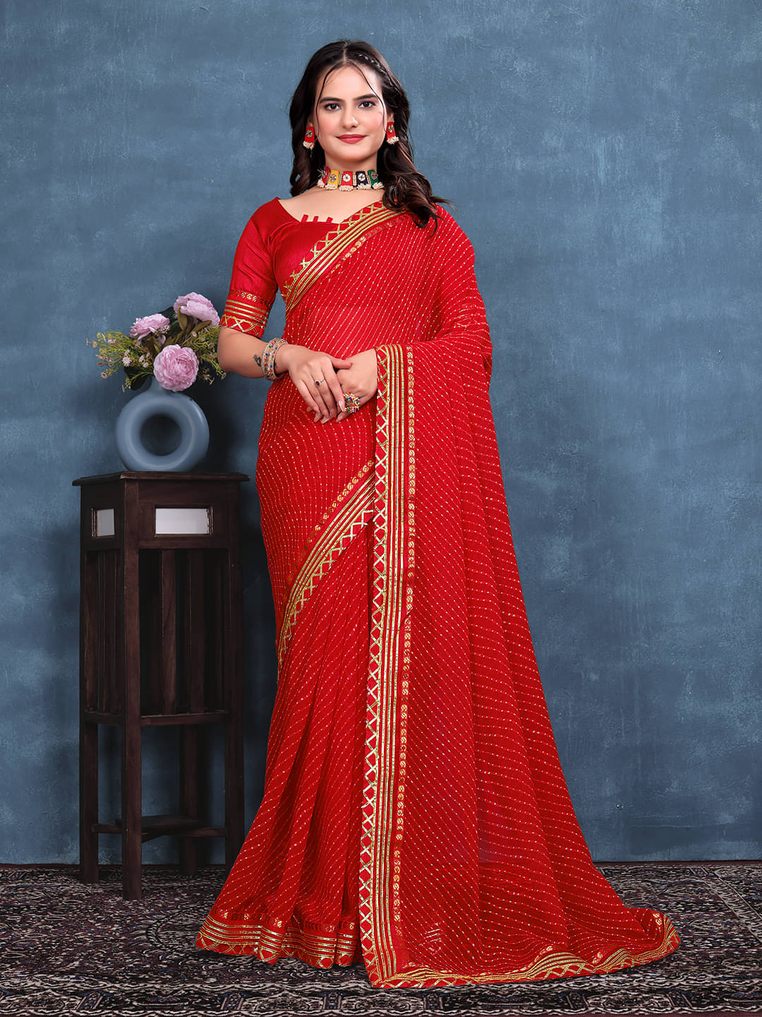 Kanooda Prints Georgette Embroidered Regular Saree With Unstitched Blouse Piece ( Red ) Kanooda Prints Georgette Embroidered Regular Saree With Unstitched Blouse Piece ( Red )
