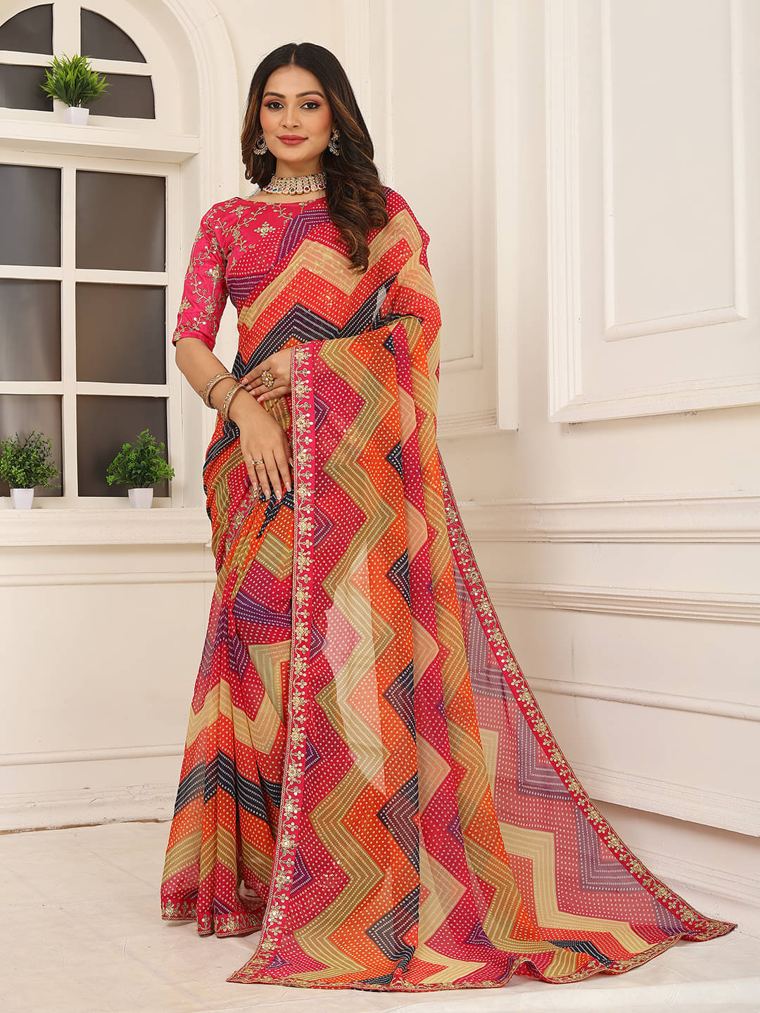     			Kanooda Prints Georgette Embroidered Regular Saree With Unstitched Blouse Piece ( Rani )