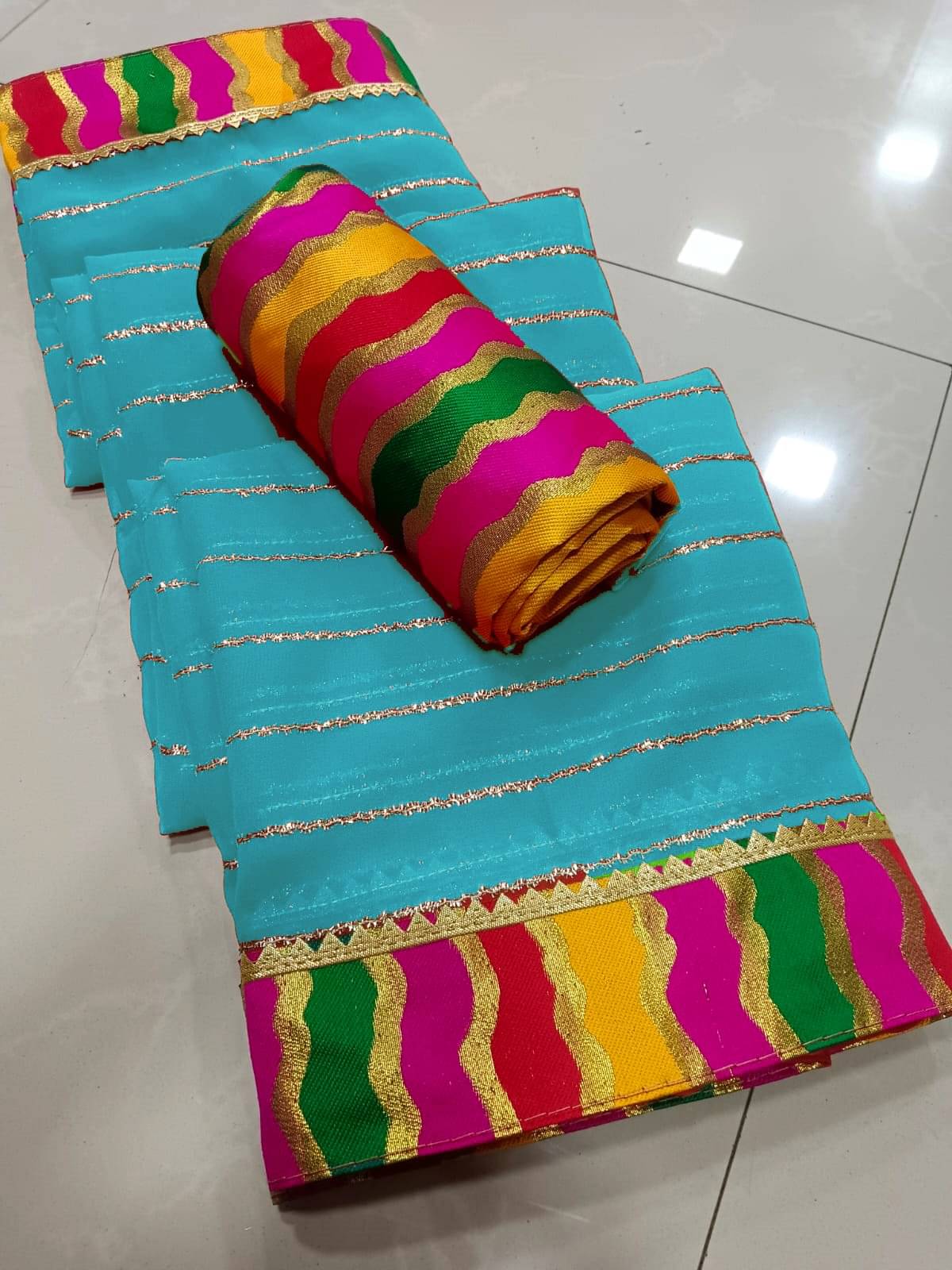     			Avenue Creation Georgette Embroidered Leheriya Saree With Unstitched Blouse Piece ( Turquoise )