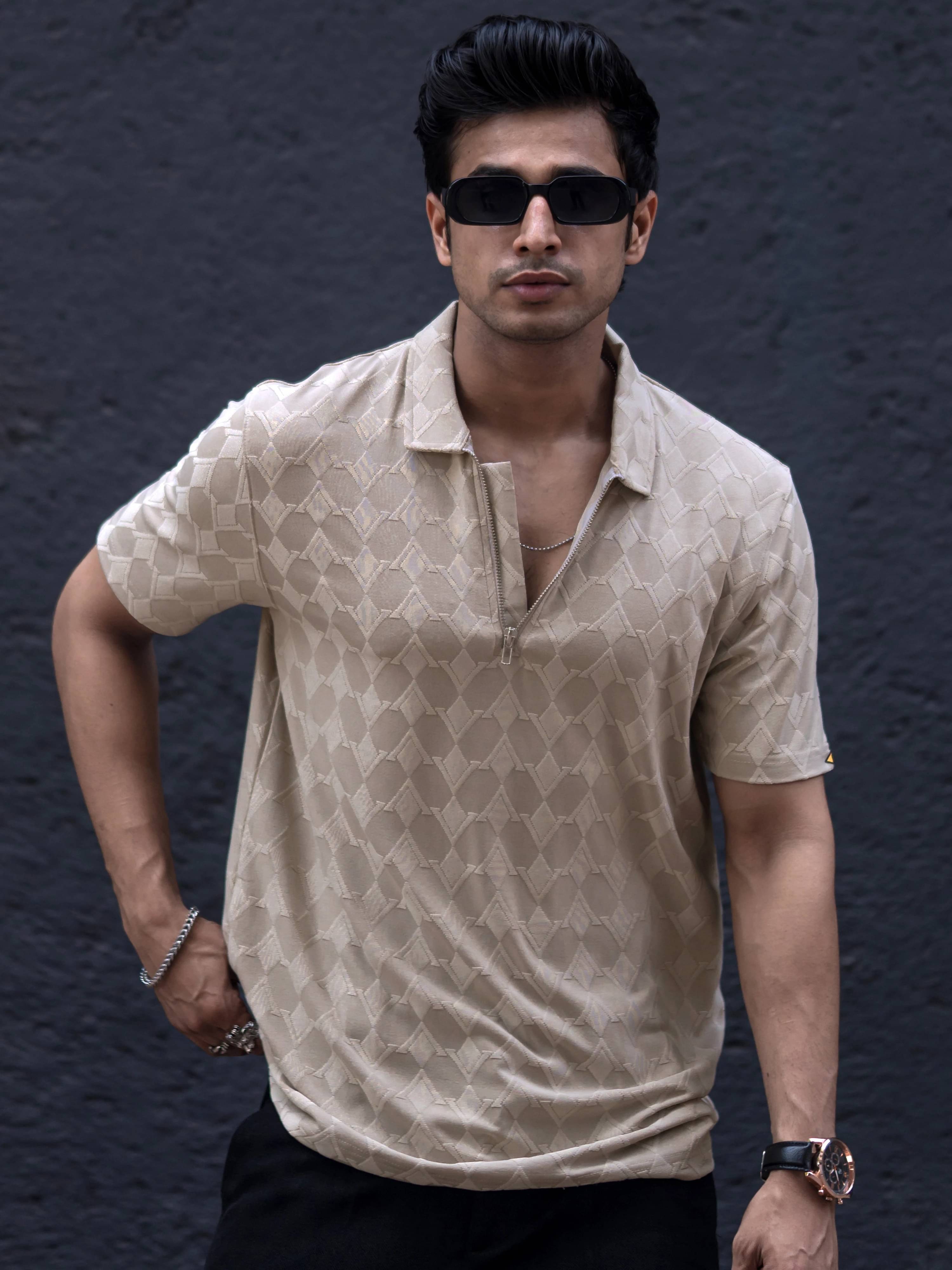 Maniac Men Cotton Blend Slim Fit Self Design Polo T Shirt ( Beige )     			Maniac Men Cotton Blend Slim Fit Self Design Polo T Shirt ( Beige )