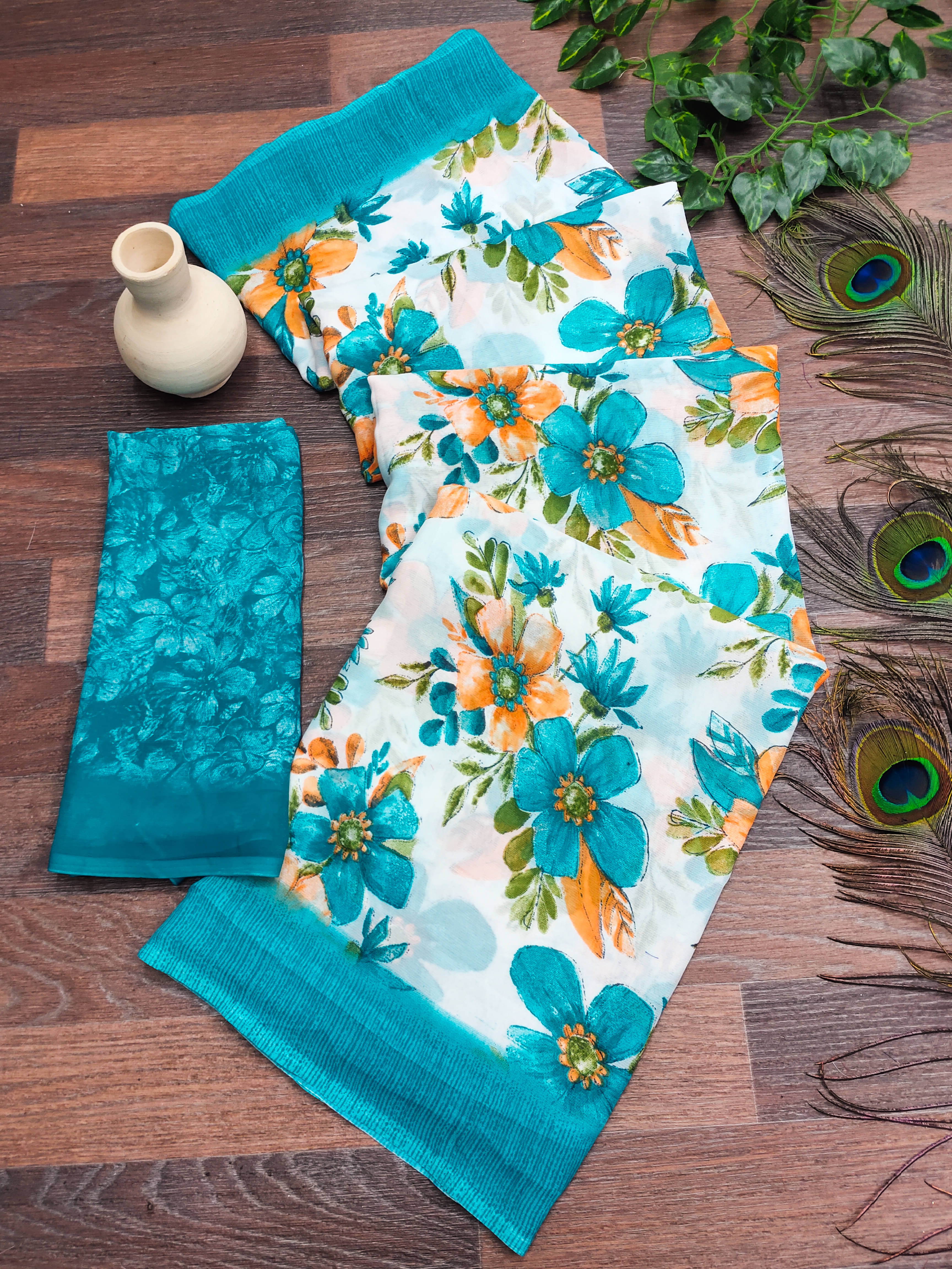 Kashvi Sarees Georgette Printed Chanderi saree With Unstitched Blouse Piece ( Aqua Blue )     			Kashvi Sarees Georgette Printed Chanderi saree With Unstitched Blouse Piece ( Aqua Blue )