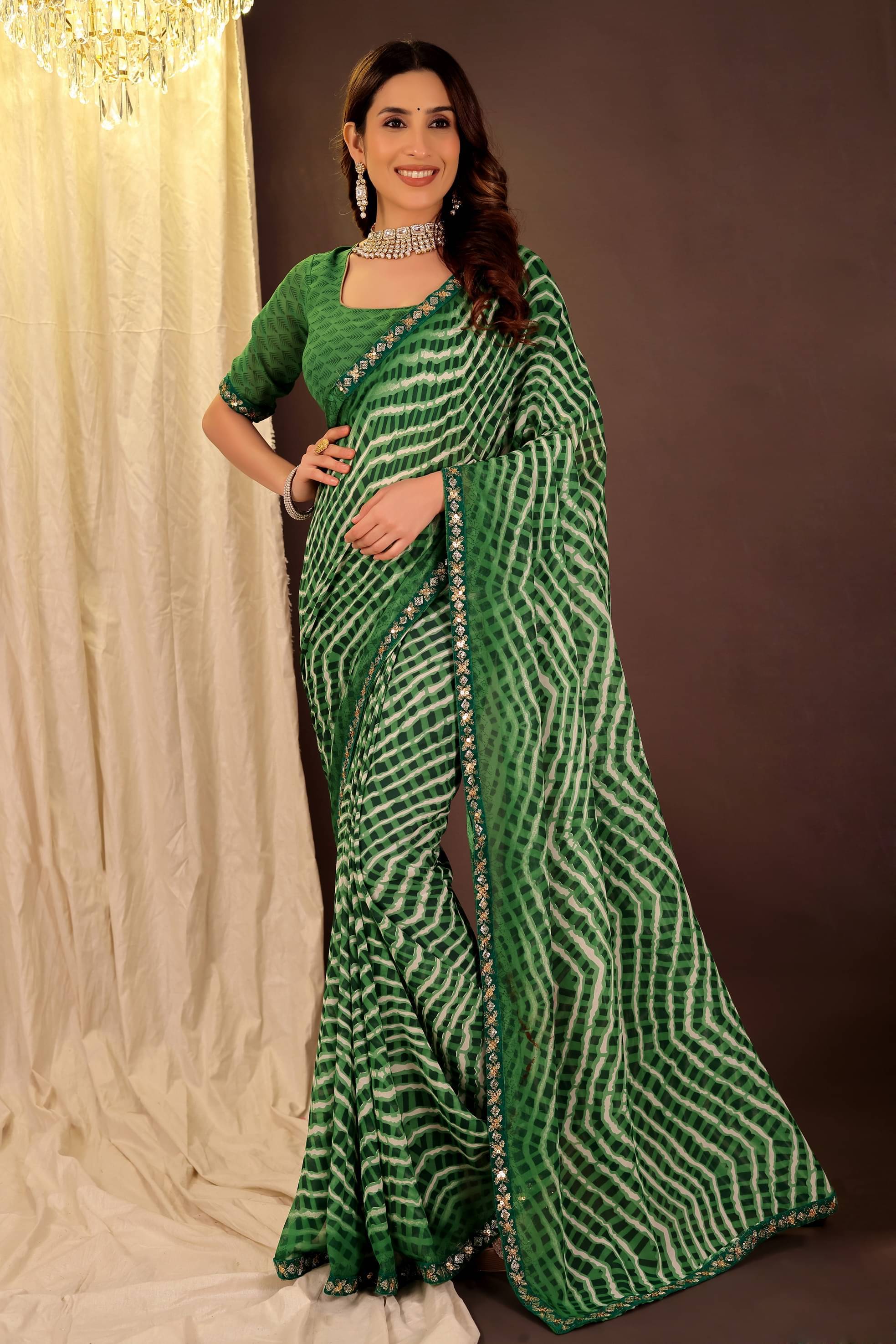 YUGAVEERAA Georgette Solid Regular Saree With Unstitched Blouse Piece ( Green ) YUGAVEERAA Georgette Solid Regular Saree With Unstitched Blouse Piece ( Green )