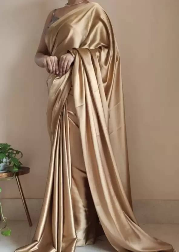 YUGAVEERAA Satin Solid Regular Saree With Unstitched Blouse Piece ( Gold ) YUGAVEERAA Satin Solid Regular Saree With Unstitched Blouse Piece ( Gold )