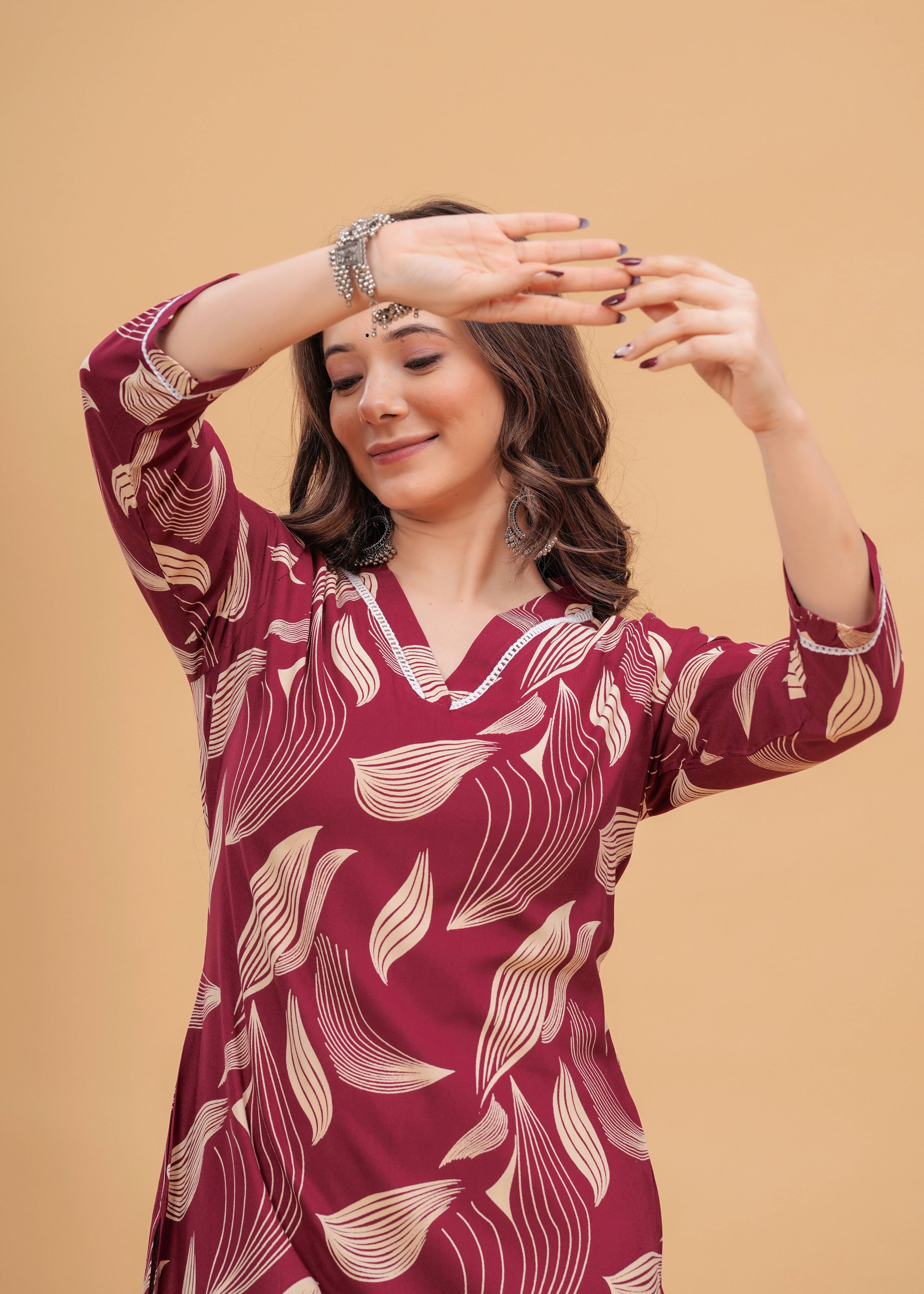     			Dressar Women Viscose Rayon Printed Straight Kurti ( Maroon )