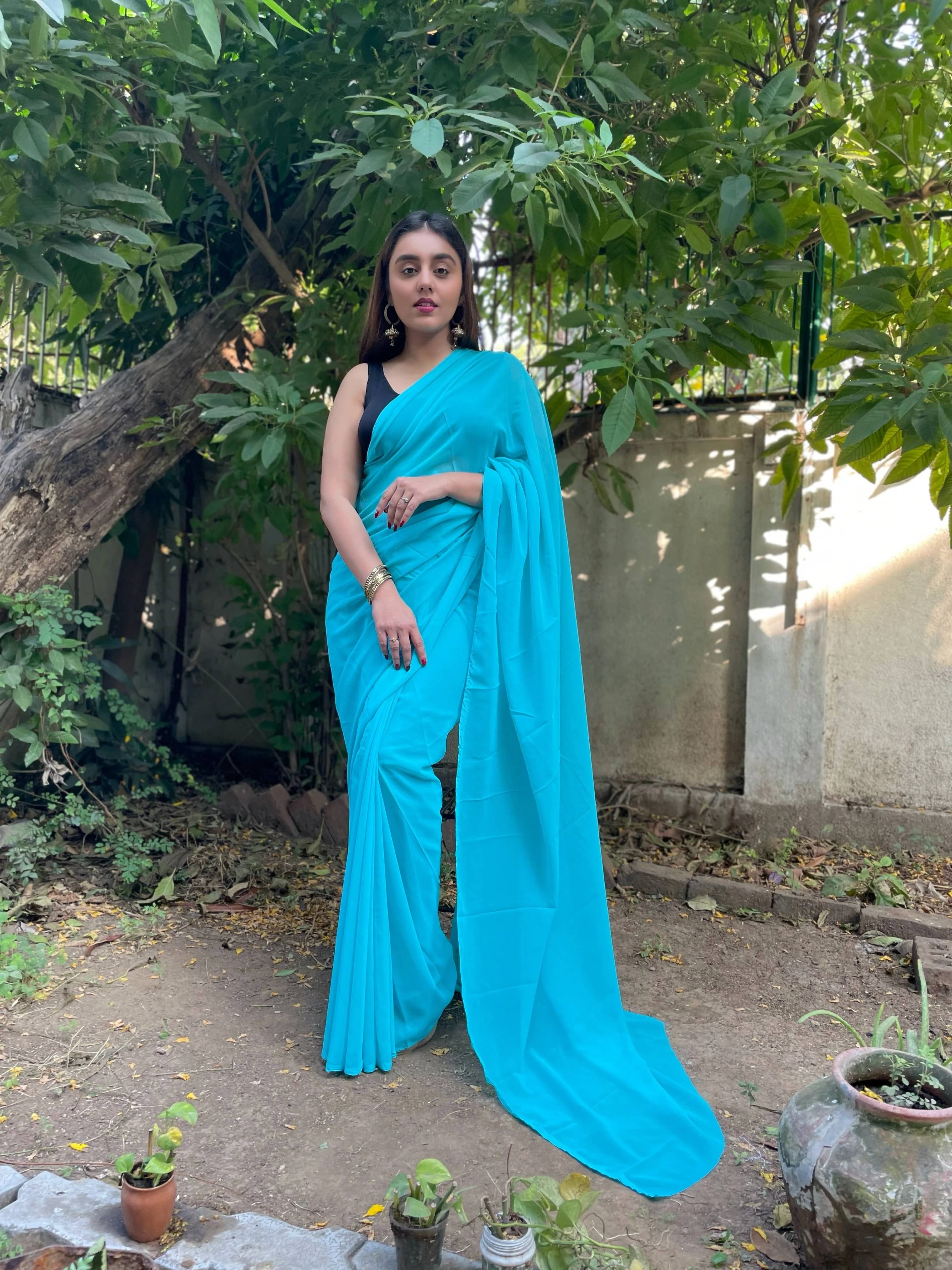 ANAND SAREES Georgette Dyed Regular Saree With Unstitched Blouse Piece ( Light Blue ) ANAND SAREES Georgette Dyed Regular Saree With Unstitched Blouse Piece ( Light Blue )