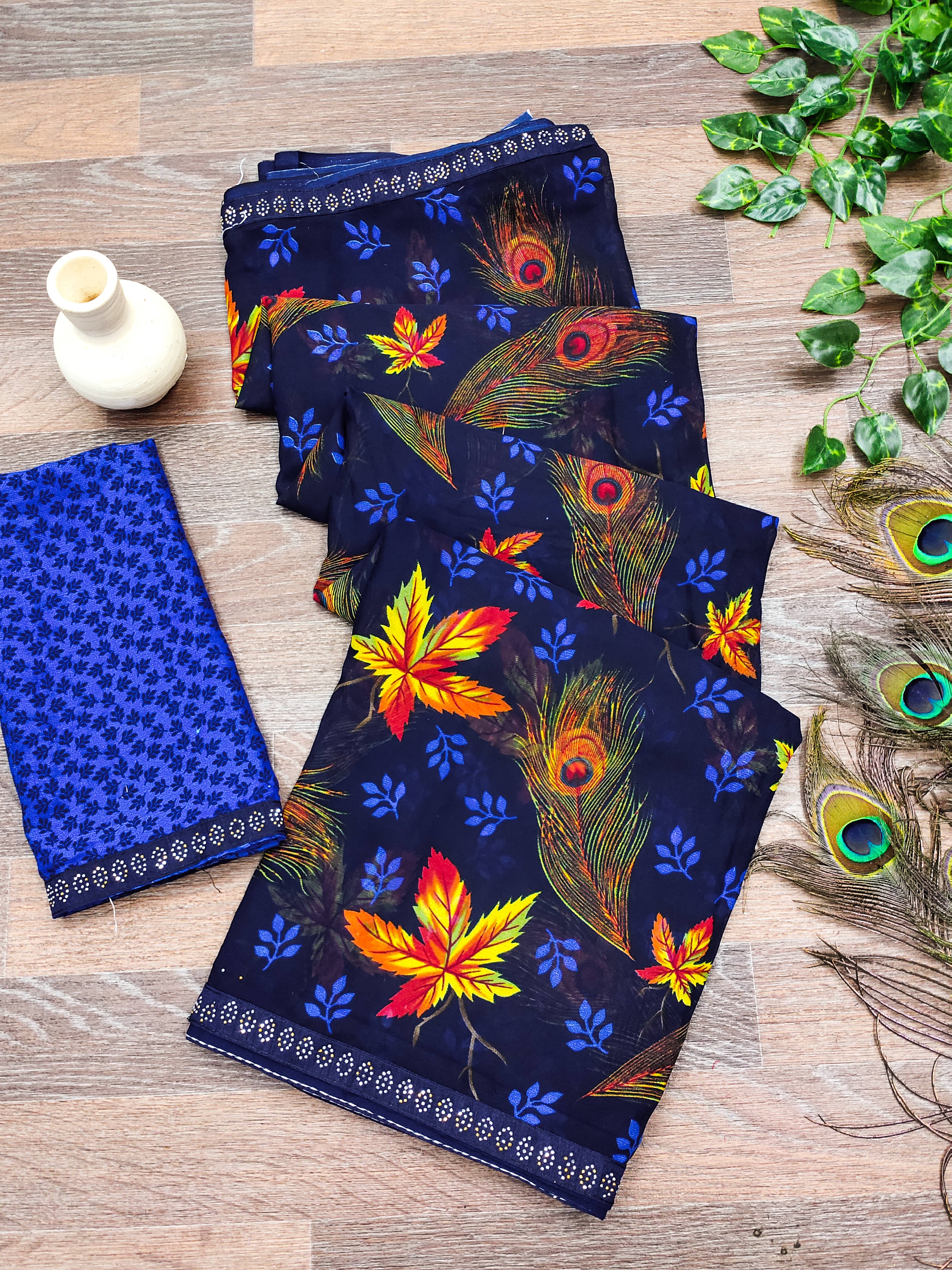 ANAND SAREES Georgette Embellished Regular Saree With Unstitched Blouse Piece ( Navy Blue ) ANAND SAREES Georgette Embellished Regular Saree With Unstitched Blouse Piece ( Navy Blue )