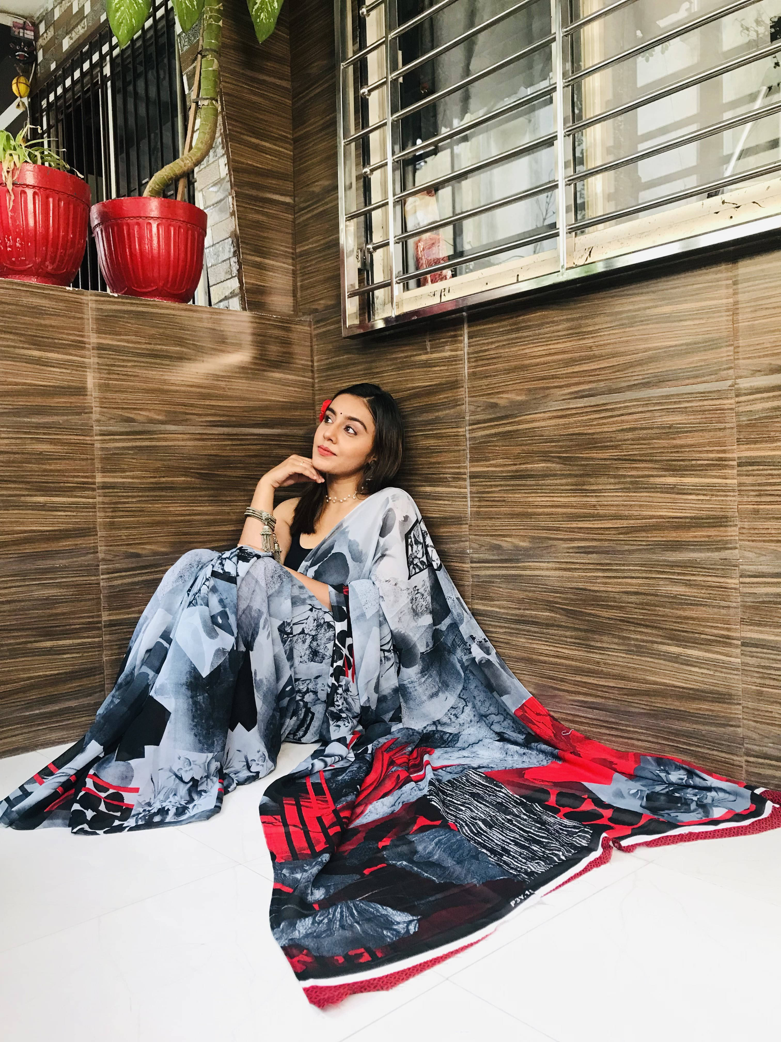 ANAND SAREES Georgette Printed Regular Saree With Unstitched Blouse Piece ( Grey )     			ANAND SAREES Georgette Printed Regular Saree With Unstitched Blouse Piece ( Grey )