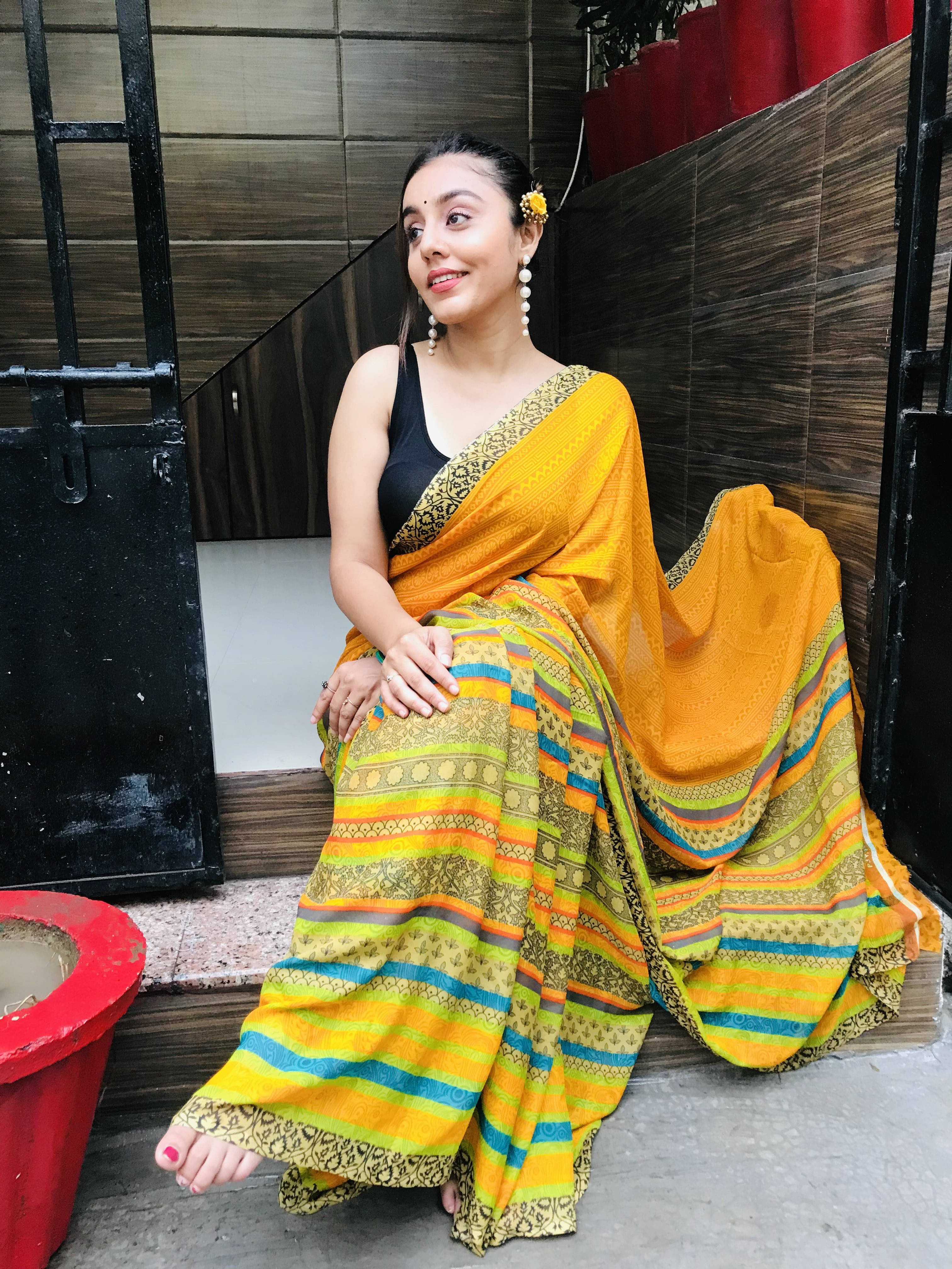 ANAND SAREES Georgette Printed Regular Saree With Unstitched Blouse Piece ( Yellow ) ANAND SAREES Georgette Printed Regular Saree With Unstitched Blouse Piece ( Yellow )