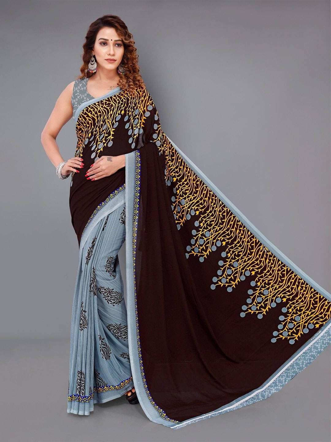 ANAND SAREES Georgette Printed Regular Saree With Unstitched Blouse Piece ( Brown )     			ANAND SAREES Georgette Printed Regular Saree With Unstitched Blouse Piece ( Brown )