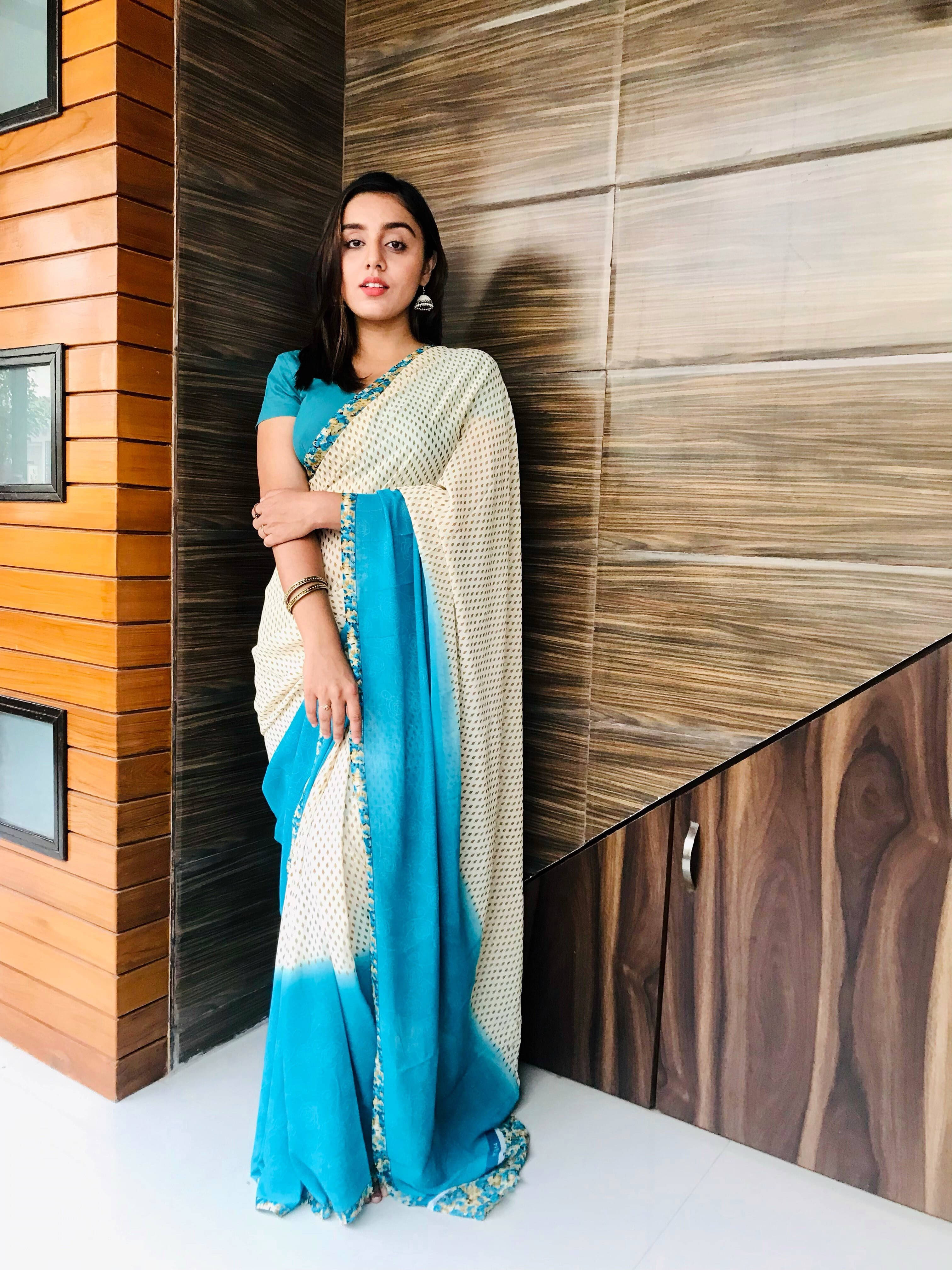 ANAND SAREES Georgette Printed Regular Saree With Unstitched Blouse Piece ( Light Blue ) ANAND SAREES Georgette Printed Regular Saree With Unstitched Blouse Piece ( Light Blue )