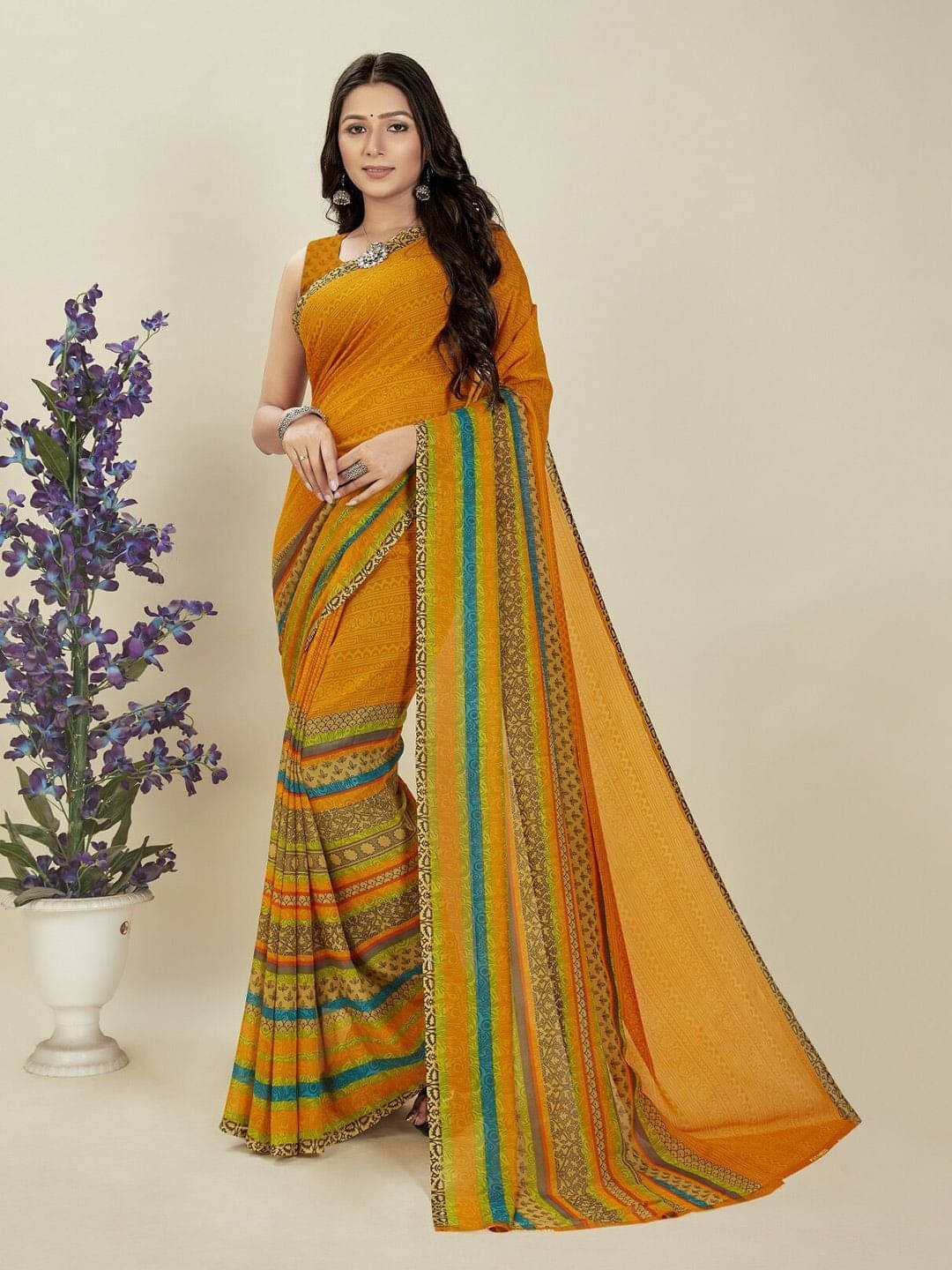 ANAND SAREES Georgette Printed Regular Saree With Unstitched Blouse Piece ( Mustard ) ANAND SAREES Georgette Printed Regular Saree With Unstitched Blouse Piece ( Mustard )