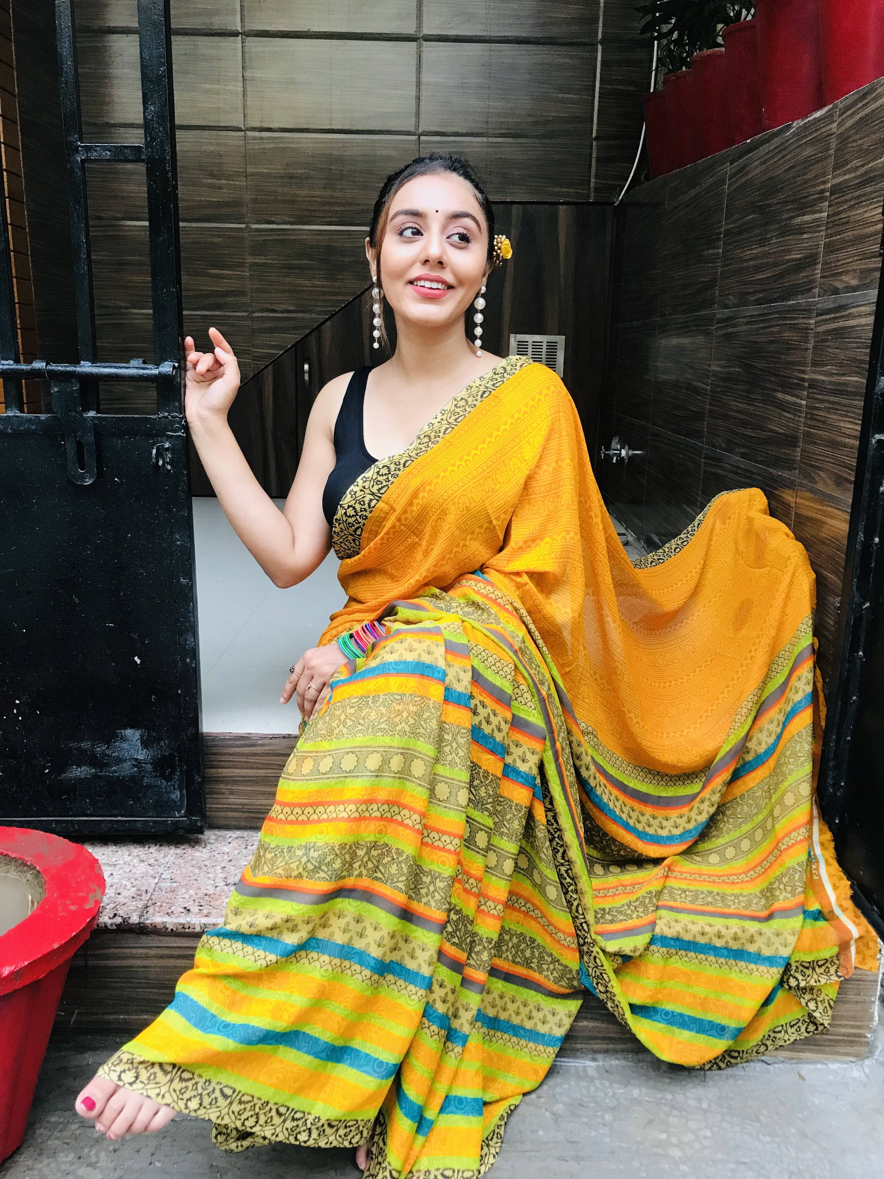 ANAND SAREES Georgette Printed Regular Saree With Unstitched Blouse Piece ( Yellow ) ANAND SAREES Georgette Printed Regular Saree With Unstitched Blouse Piece ( Yellow )
