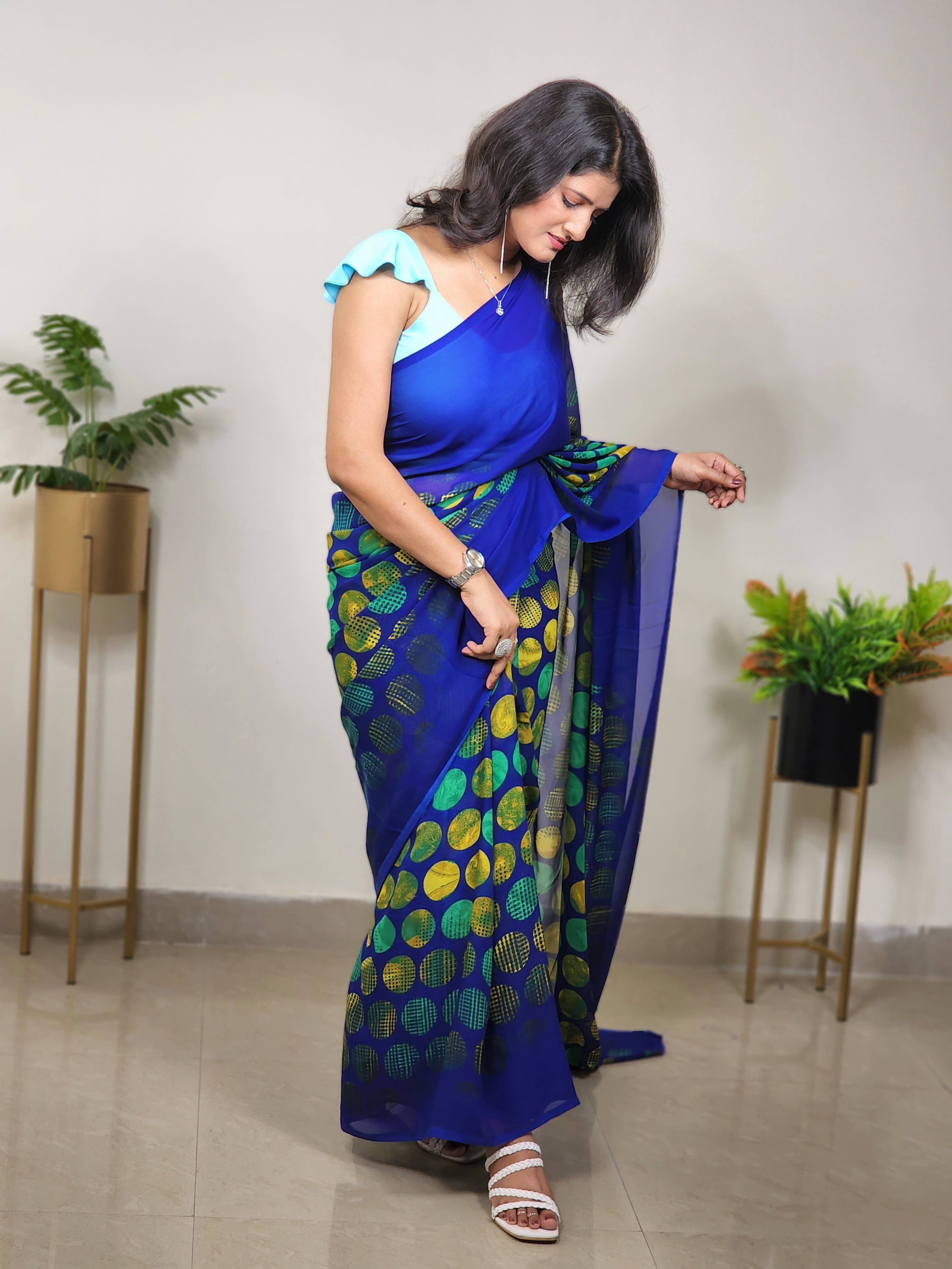 ANAND SAREES Georgette Printed Regular Saree With Unstitched Blouse Piece ( Blue ) ANAND SAREES Georgette Printed Regular Saree With Unstitched Blouse Piece ( Blue )