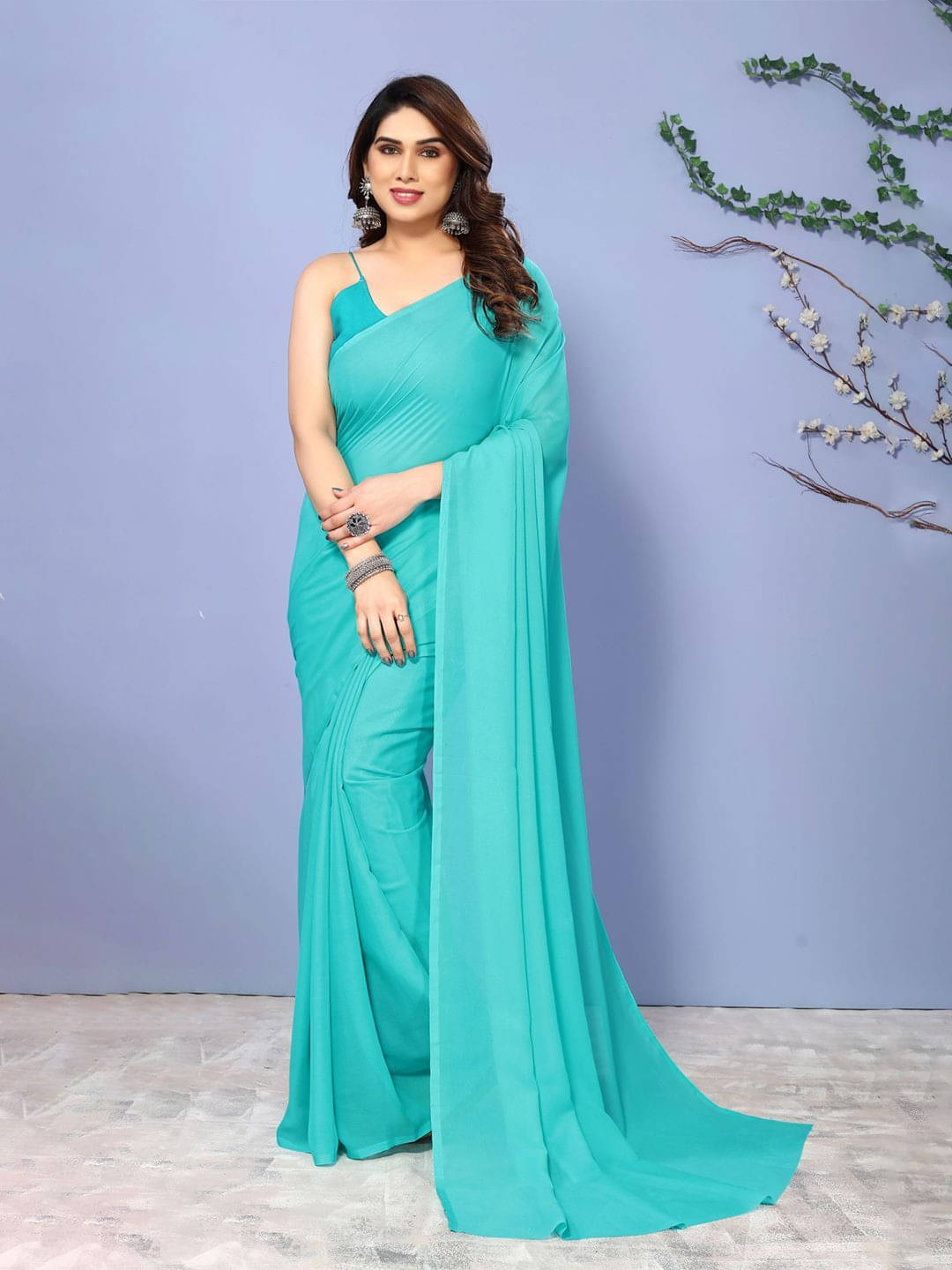 ANAND SAREES Georgette Printed Regular Saree With Unstitched Blouse Piece ( Blue ) ANAND SAREES Georgette Printed Regular Saree With Unstitched Blouse Piece ( Blue )