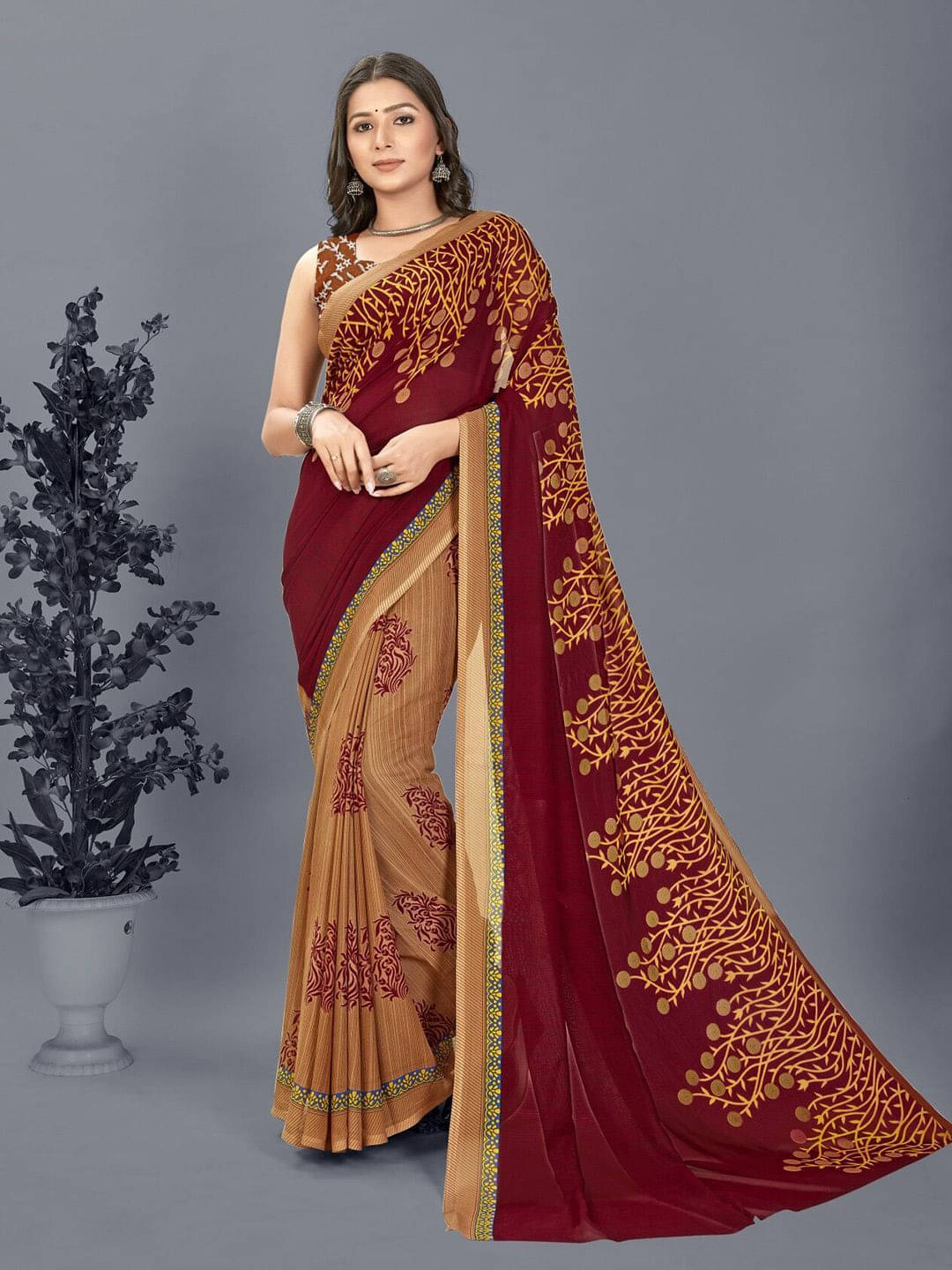 ANAND SAREES Georgette Printed Regular Saree With Unstitched Blouse Piece ( Brown ) ANAND SAREES Georgette Printed Regular Saree With Unstitched Blouse Piece ( Brown )