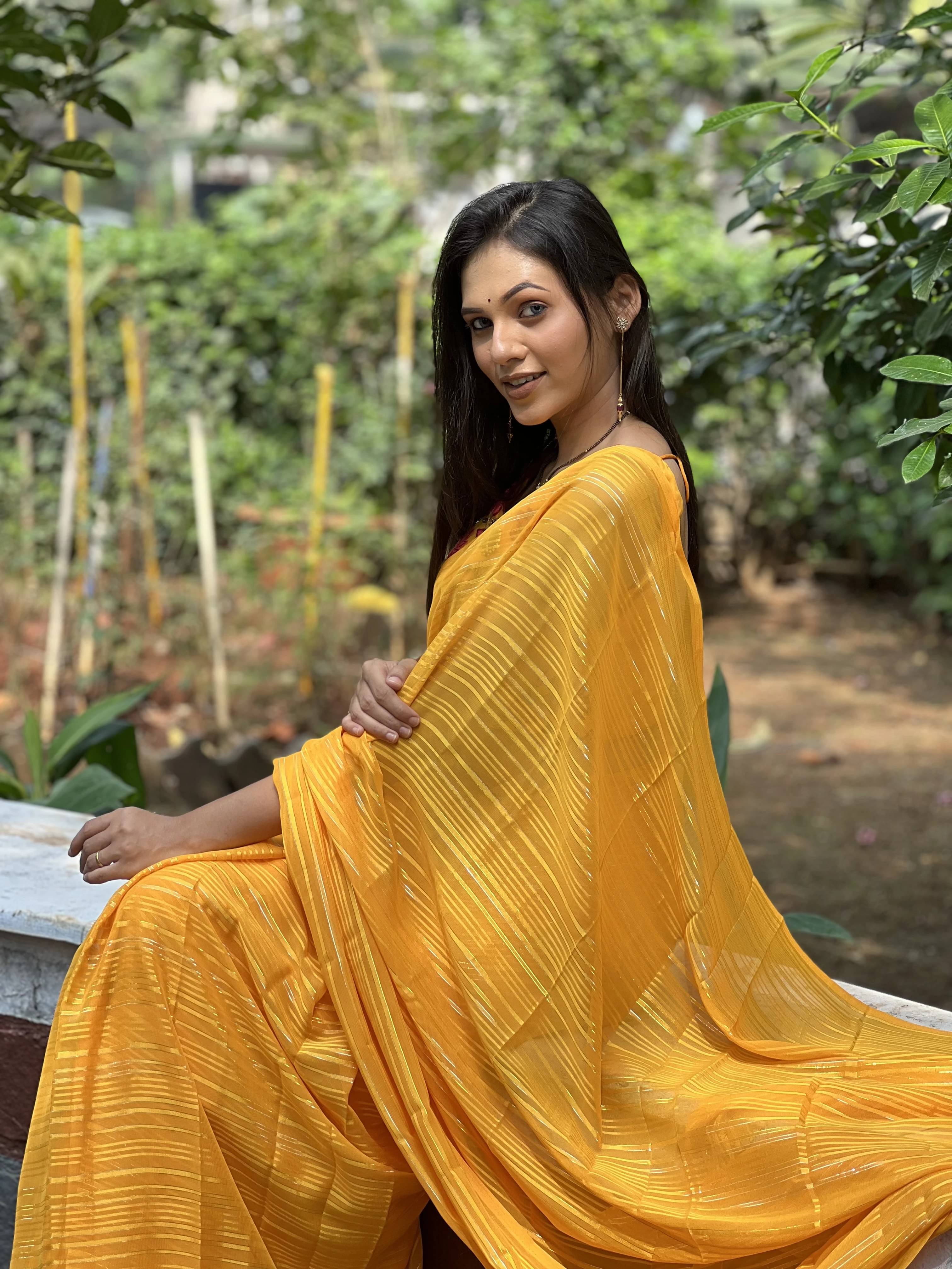 ANAND SAREES Georgette Printed Regular Saree With Unstitched Blouse Piece ( Yellow ) ANAND SAREES Georgette Printed Regular Saree With Unstitched Blouse Piece ( Yellow )