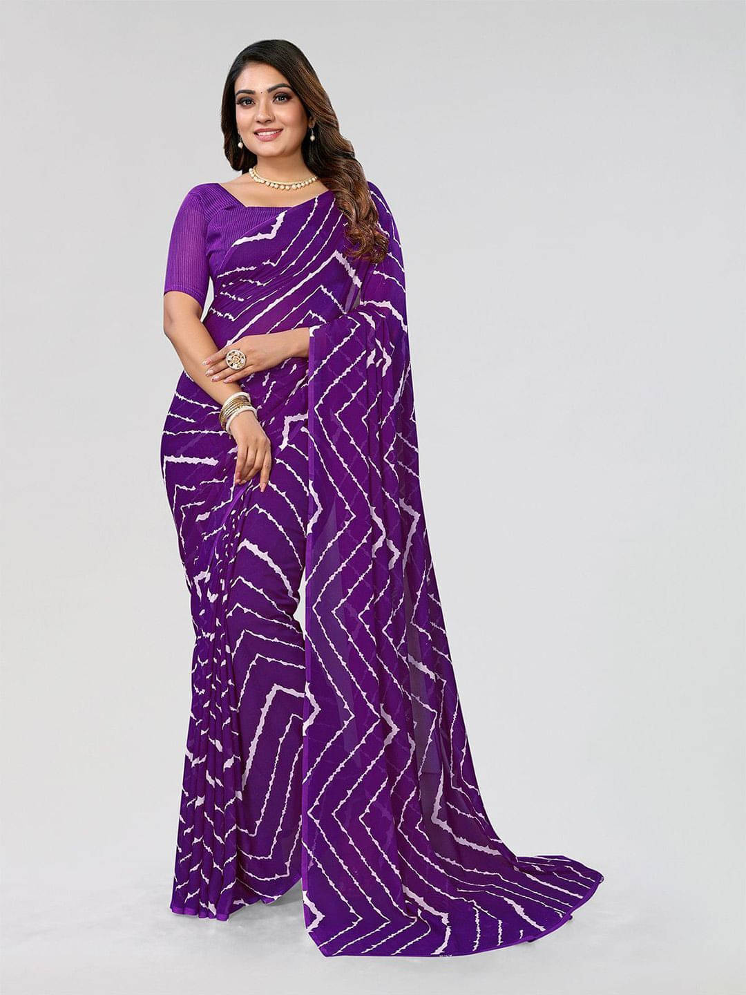 ANAND SAREES Georgette Self Design Regular Saree With Unstitched Blouse Piece ( Purple ) ANAND SAREES Georgette Self Design Regular Saree With Unstitched Blouse Piece ( Purple )