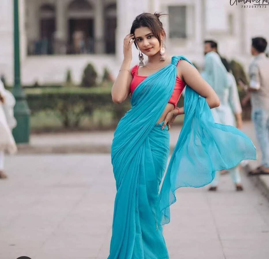 ANAND SAREES Georgette Solid Regular Saree With Unstitched Blouse Piece ( Light Blue ) ANAND SAREES Georgette Solid Regular Saree With Unstitched Blouse Piece ( Light Blue )