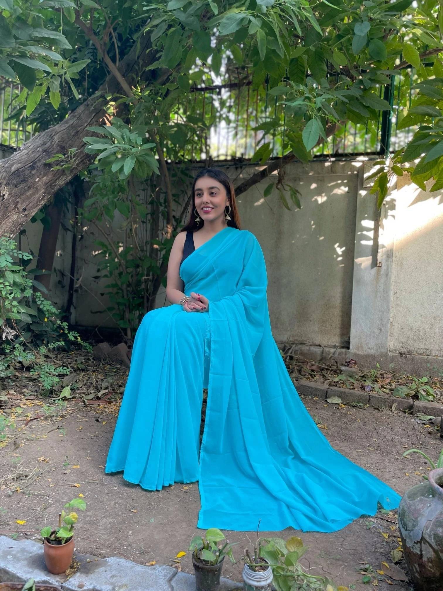     			ANAND SAREES Georgette Solid Regular Saree With Unstitched Blouse Piece ( Light Blue )