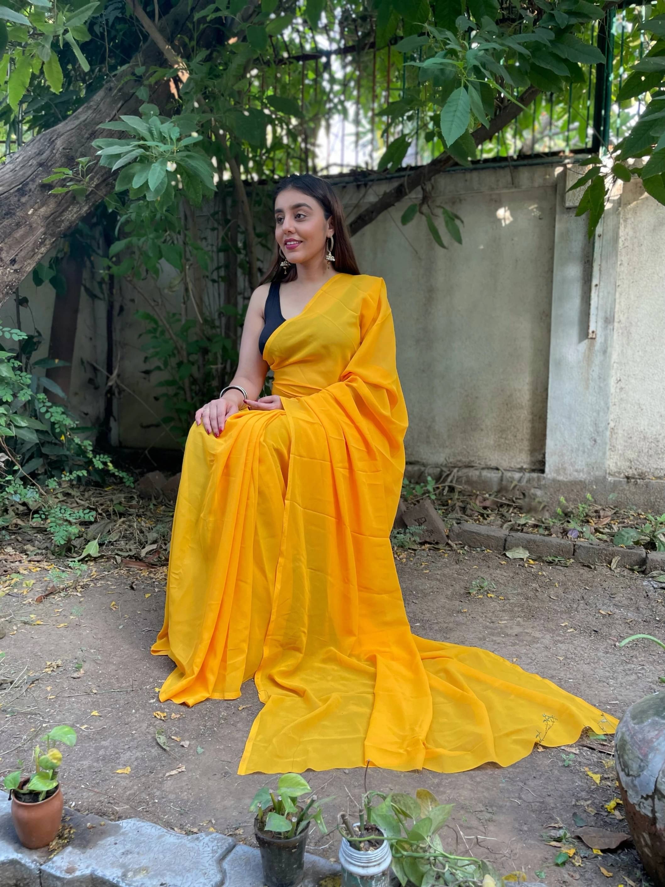     			ANAND SAREES Georgette Solid Regular Saree With Unstitched Blouse Piece ( Yellow )