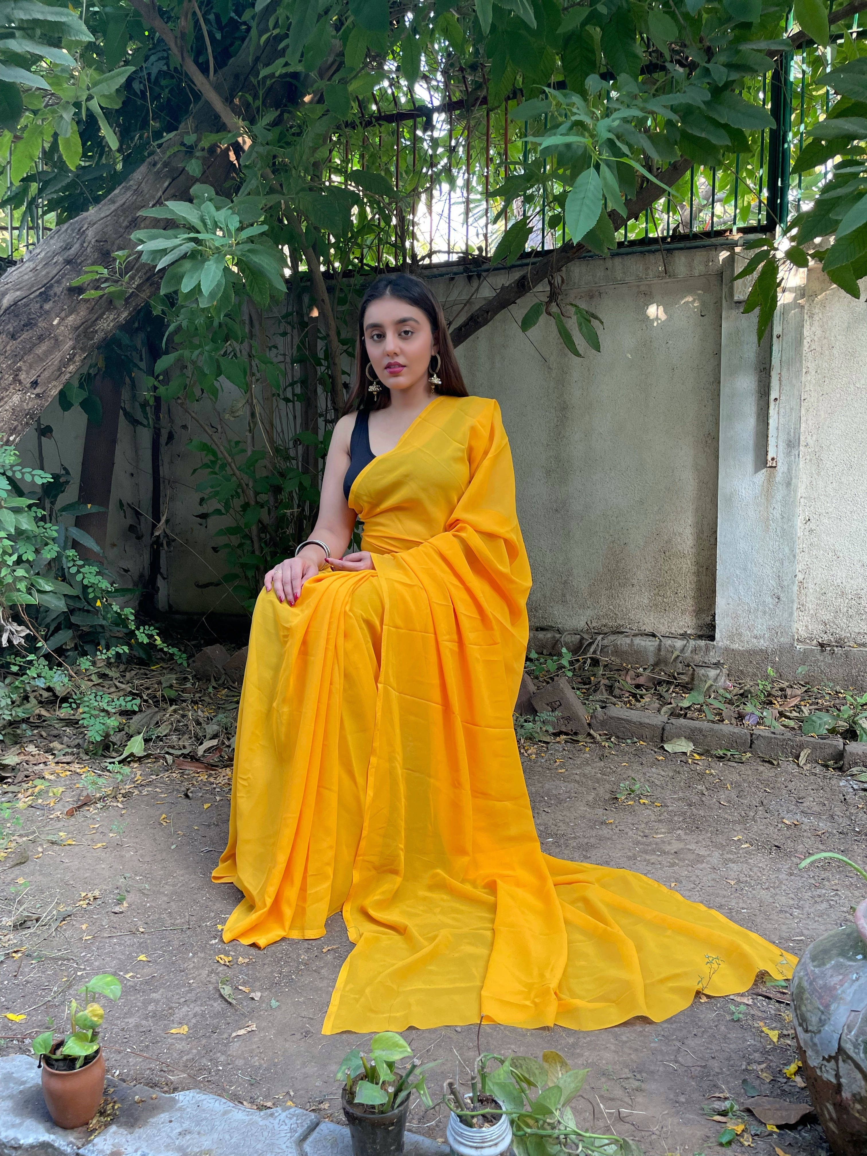     			ANAND SAREES Georgette Solid Regular Saree With Unstitched Blouse Piece ( Yellow )