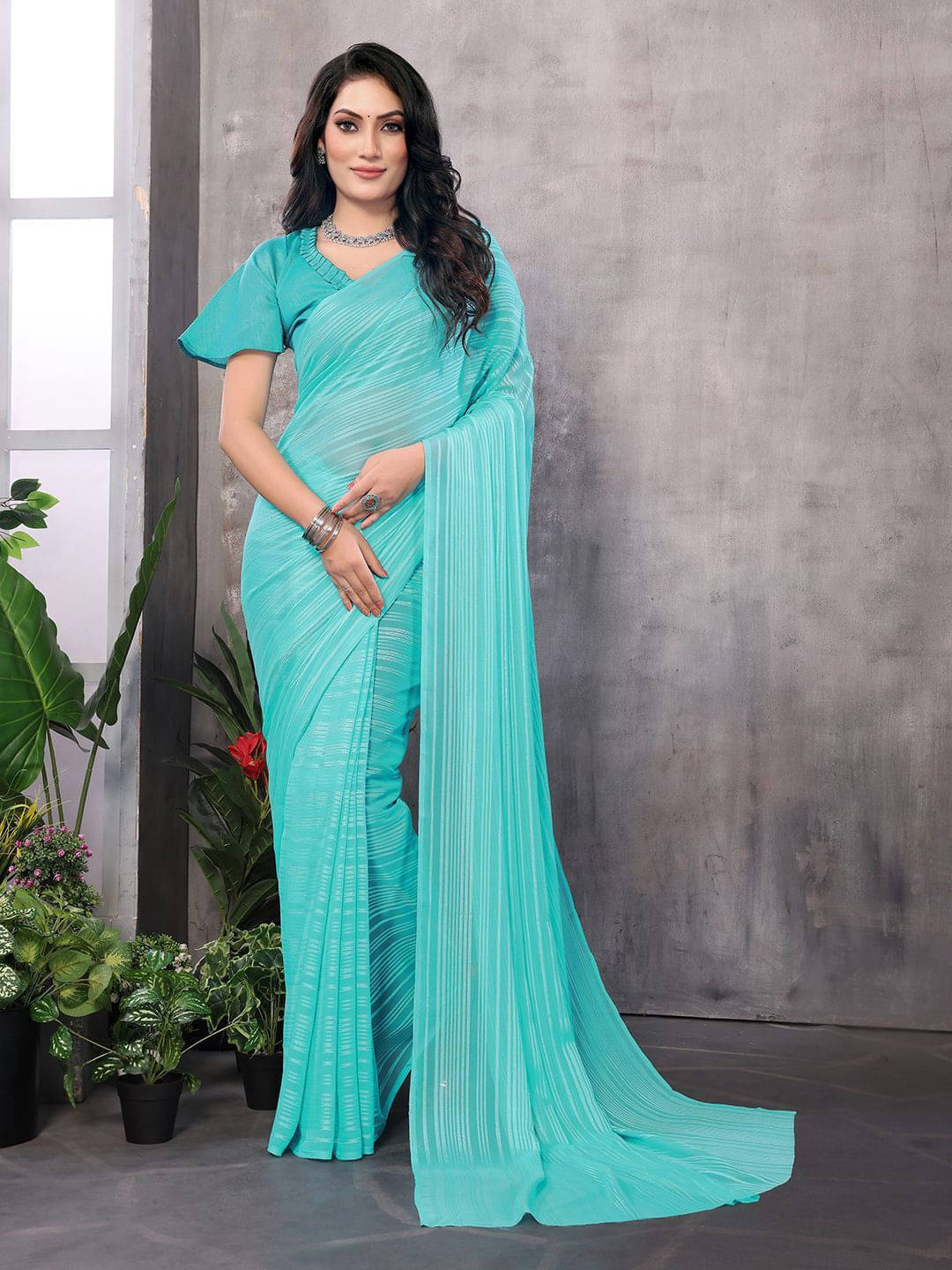 ANAND SAREES Satin Self Design Regular Saree With Unstitched Blouse Piece ( Blue ) ANAND SAREES Satin Self Design Regular Saree With Unstitched Blouse Piece ( Blue )