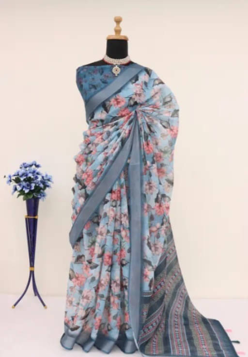 Grubstaker Linen Printed Regular Saree With Unstitched Blouse Piece ( Light Blue ) Grubstaker Linen Printed Regular Saree With Unstitched Blouse Piece ( Light Blue )