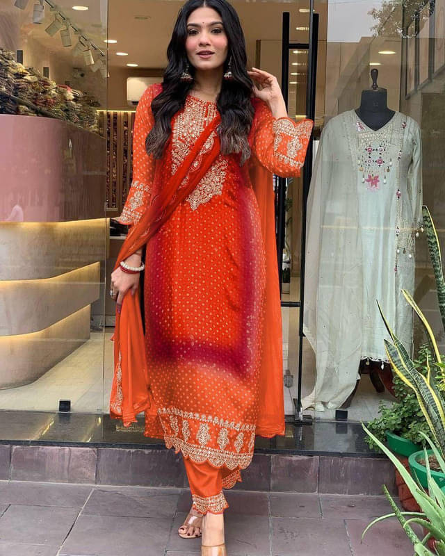     			Garv Enterprises Women Silk Embroidered Straight Kurti With Pants ( Orange )