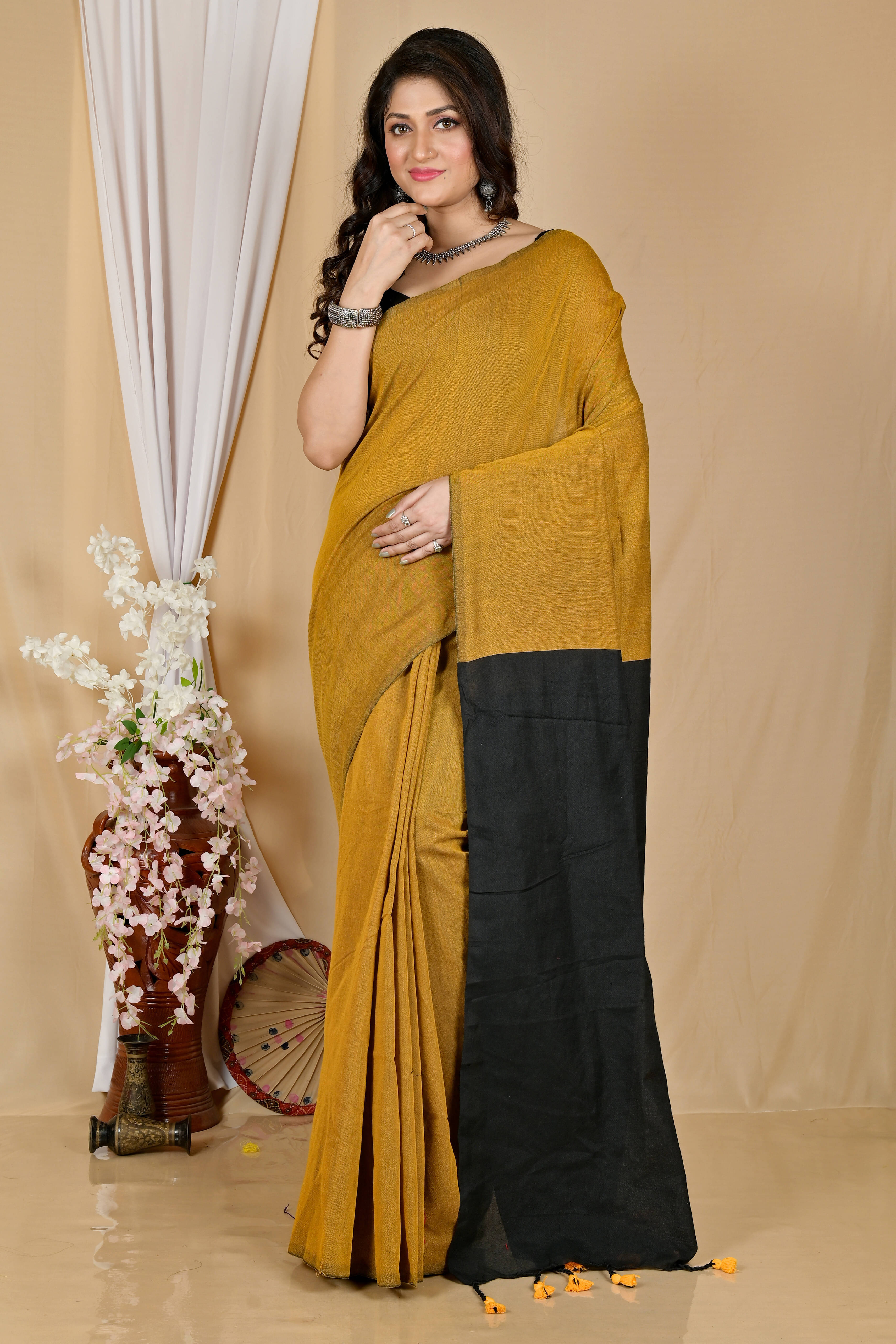 BRYNBRIT Cotton Blend Self Design Regular Saree Without Blouse Piece ( Yellow ) BRYNBRIT Cotton Blend Self Design Regular Saree Without Blouse Piece ( Yellow )