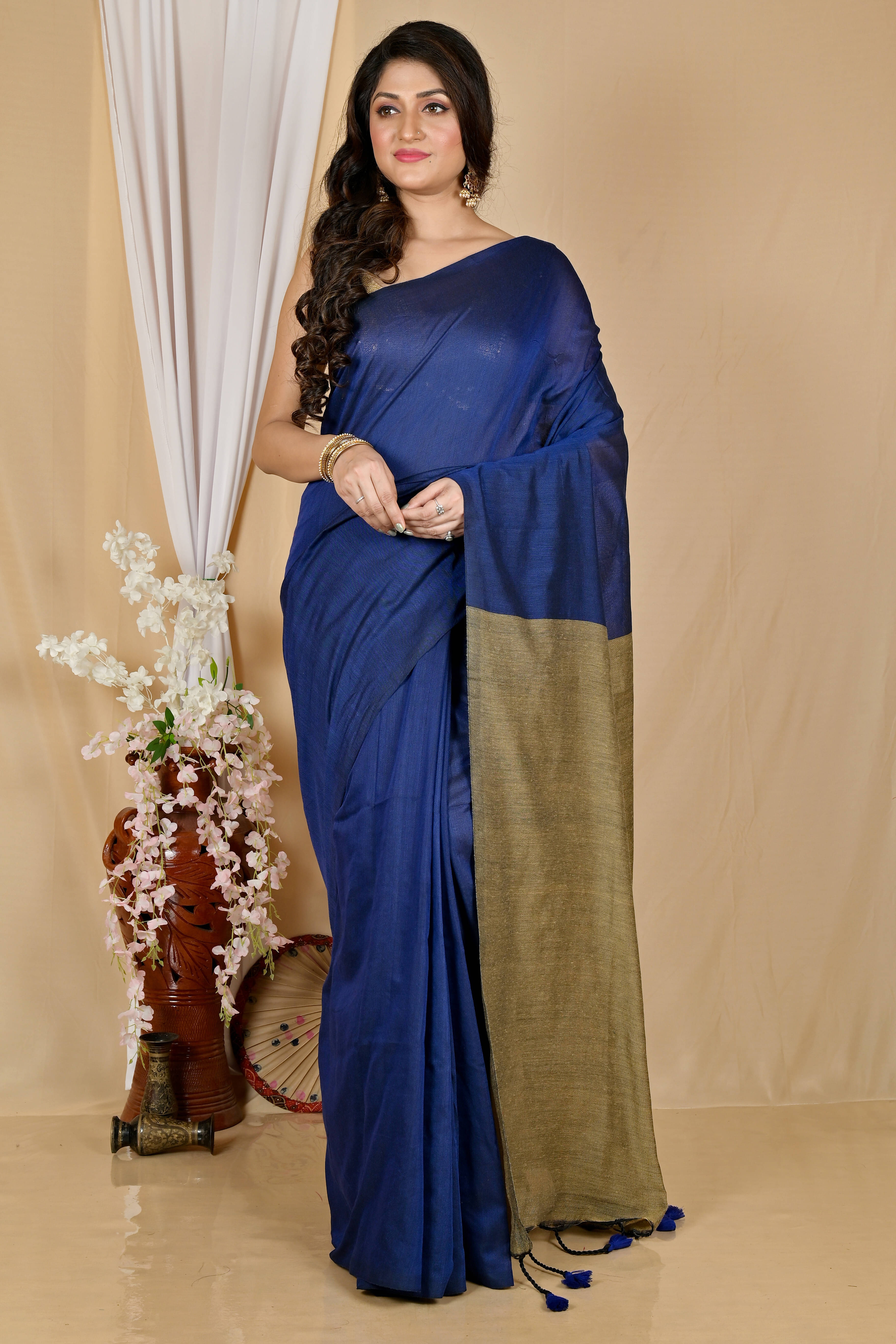 BRYNBRIT Cotton Blend Self Design Regular Saree Without Blouse Piece ( Blue ) BRYNBRIT Cotton Blend Self Design Regular Saree Without Blouse Piece ( Blue )