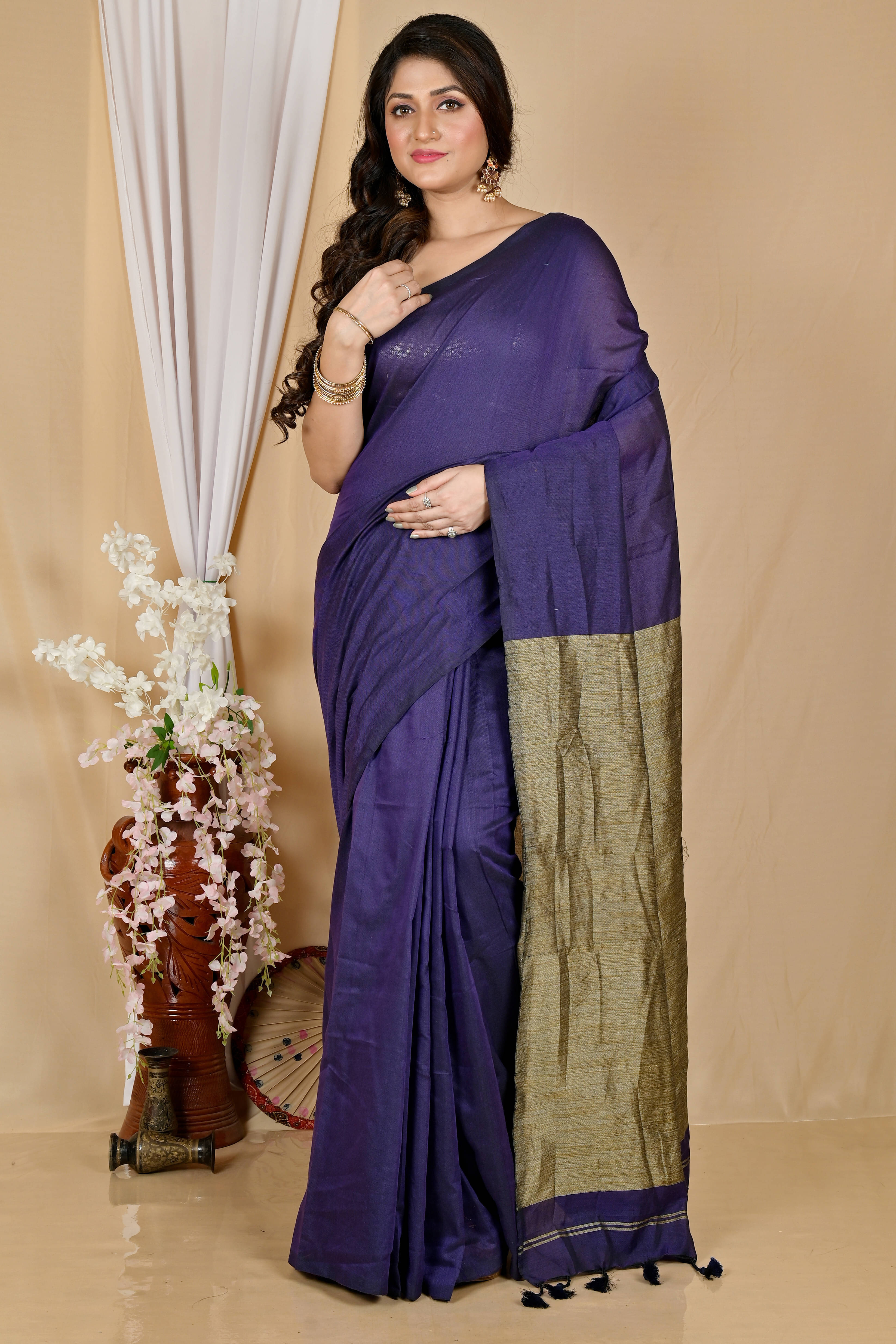 BRYNBRIT Cotton Self Design Regular Saree With Unstitched Blouse Piece ( Purple ) BRYNBRIT Cotton Self Design Regular Saree With Unstitched Blouse Piece ( Purple )