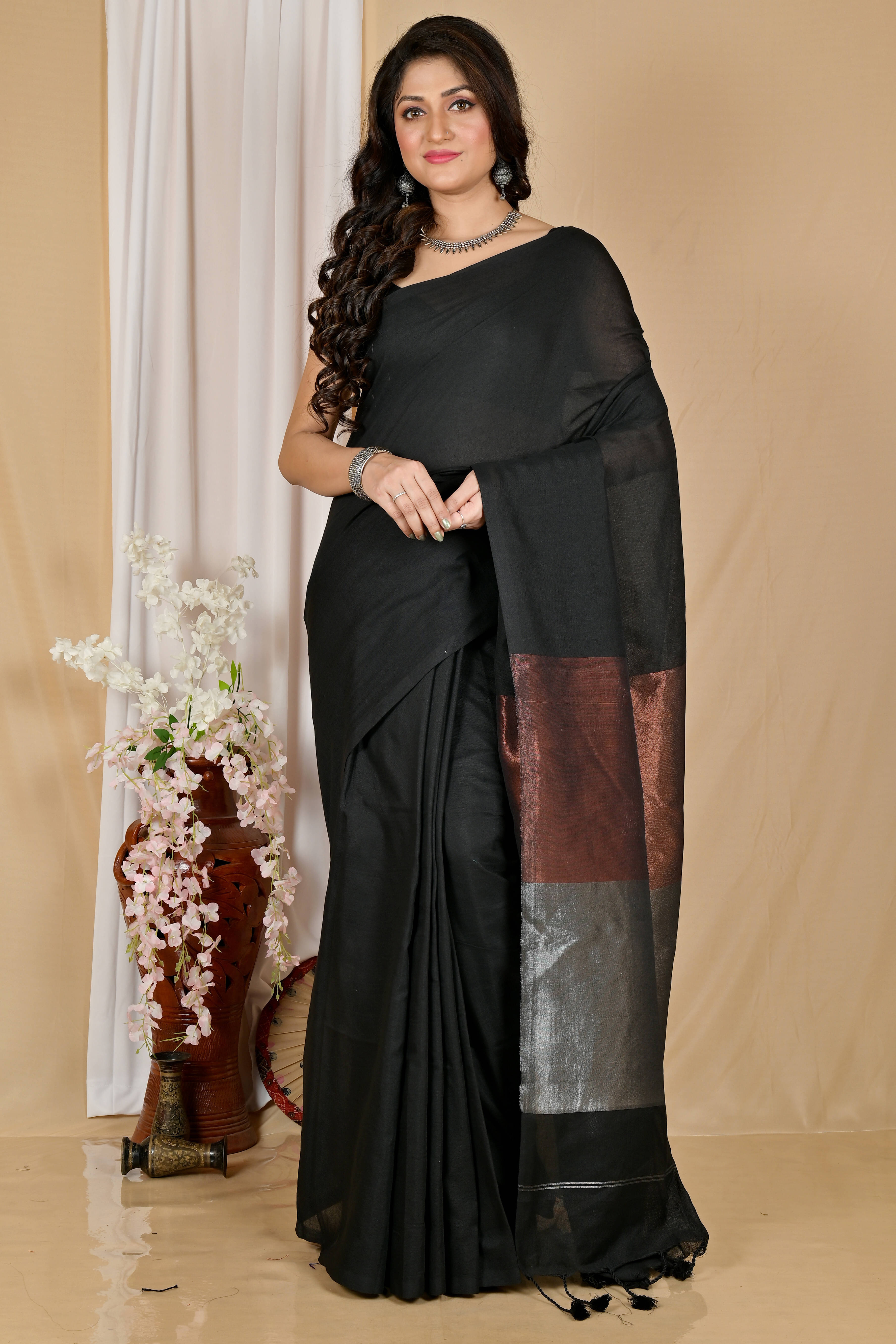 BRYNBRIT Cotton Self Design Regular Saree With Unstitched Blouse Piece ( Black ) BRYNBRIT Cotton Self Design Regular Saree With Unstitched Blouse Piece ( Black )