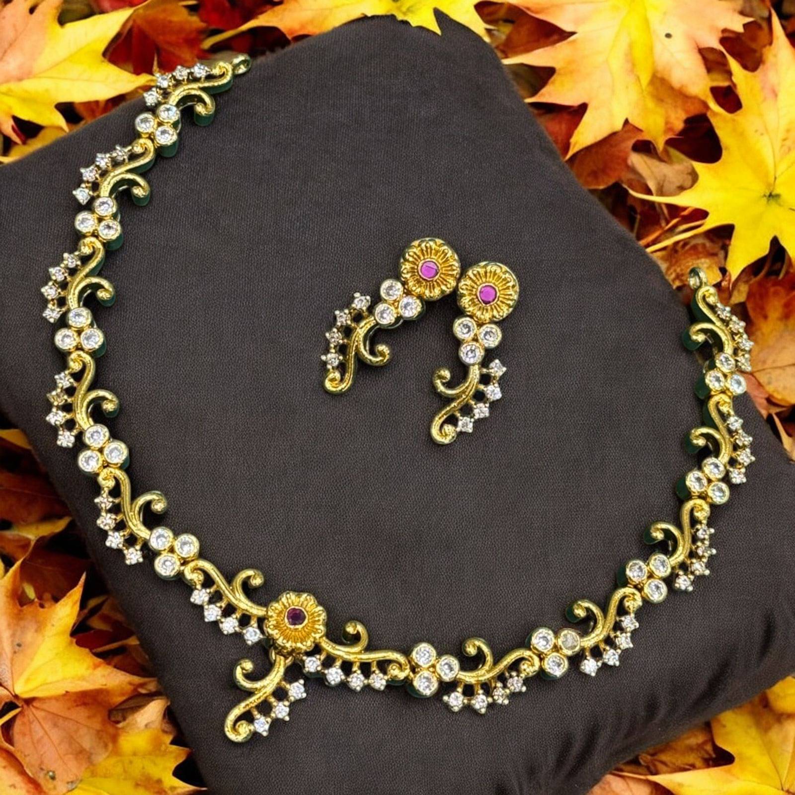     			KC JEWELS Multi Color Brass Necklace Set ( Pack of 1 )