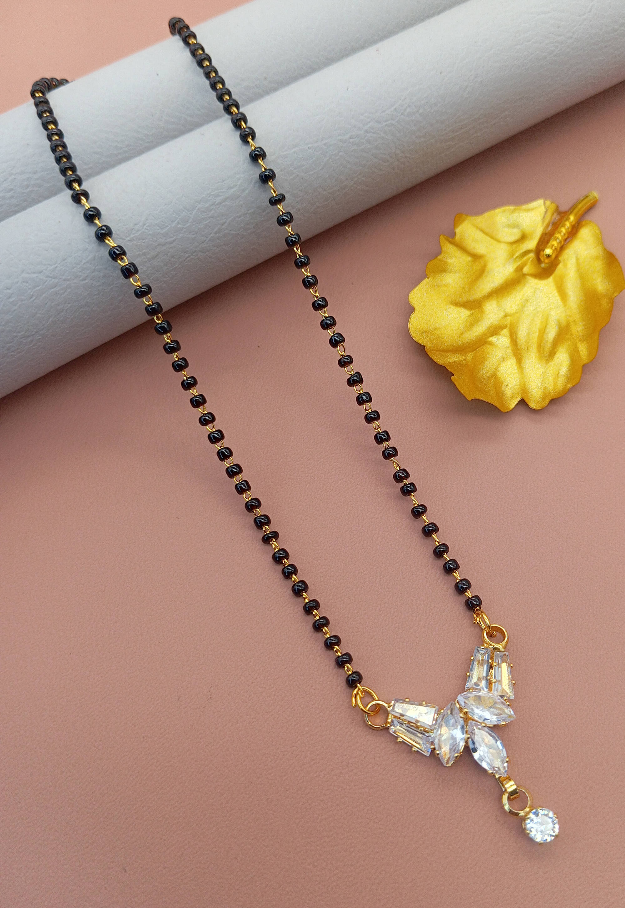     			SHANKHRAJ MA LL Golden Mangalsutra ( Pack of 1 )