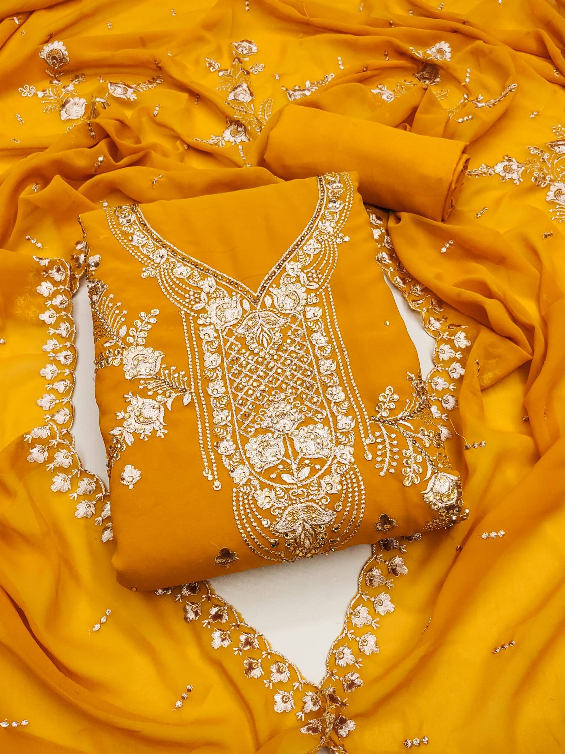 Shree Mahantam Women Georgette Unstitched Dress Material ( Orange ) Shree Mahantam Women Georgette Unstitched Dress Material ( Orange )
