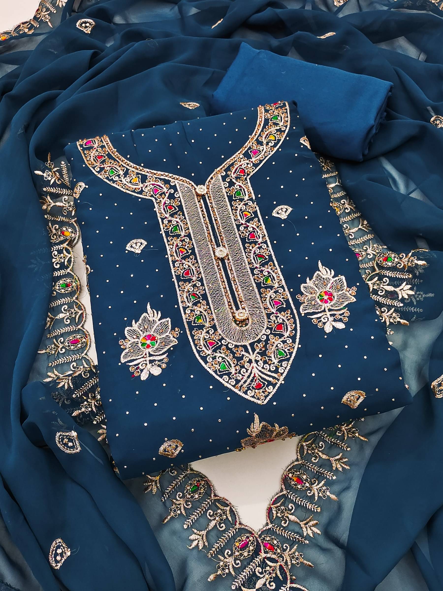 Shree Mahantam Women Georgette Unstitched Dress Material ( Blue )     			Shree Mahantam Women Georgette Unstitched Dress Material ( Blue )