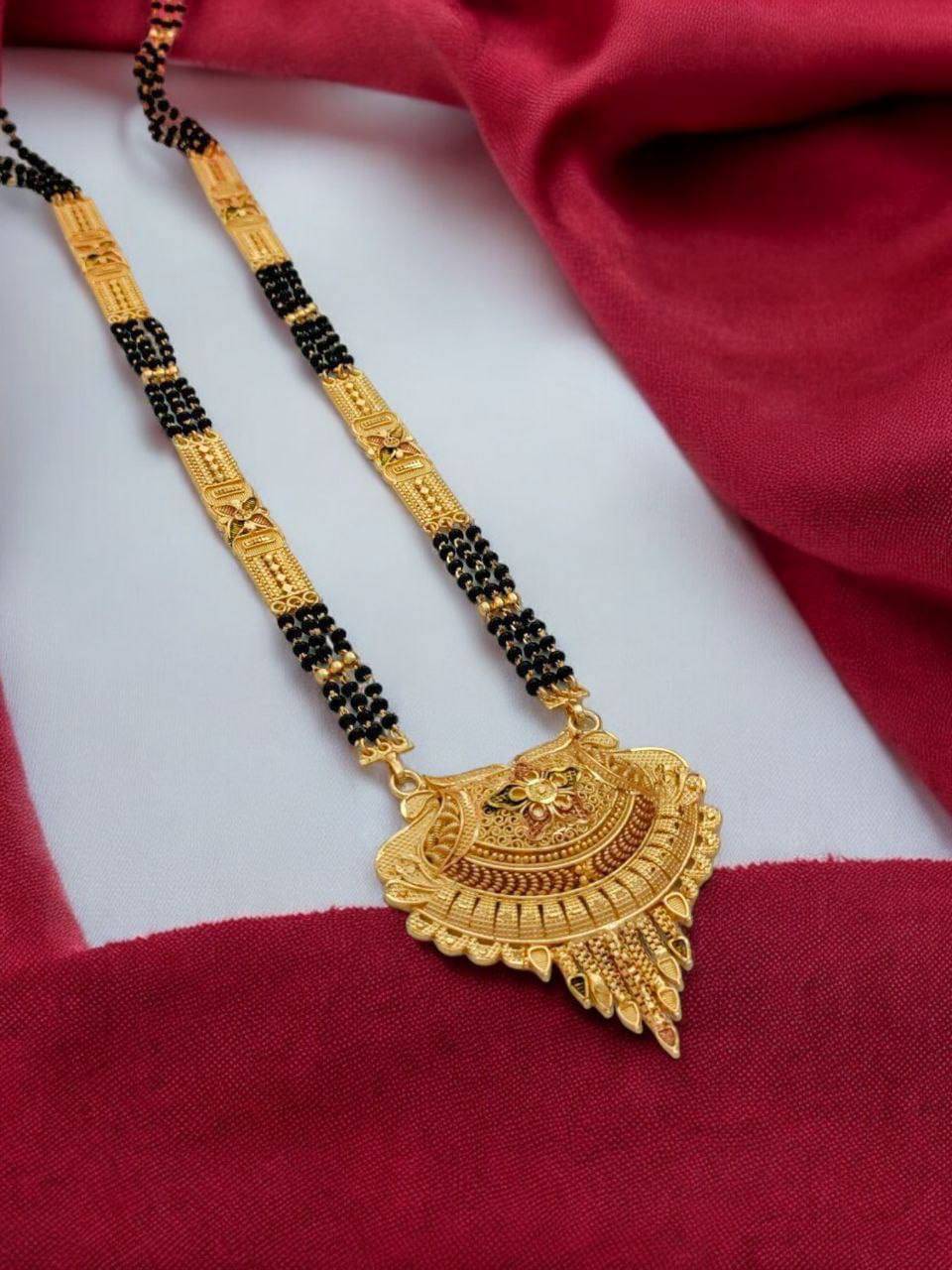 OCHORI Golden Mangalsutra Set ( Pack of 1 )     			OCHORI Golden Mangalsutra Set ( Pack of 1 )