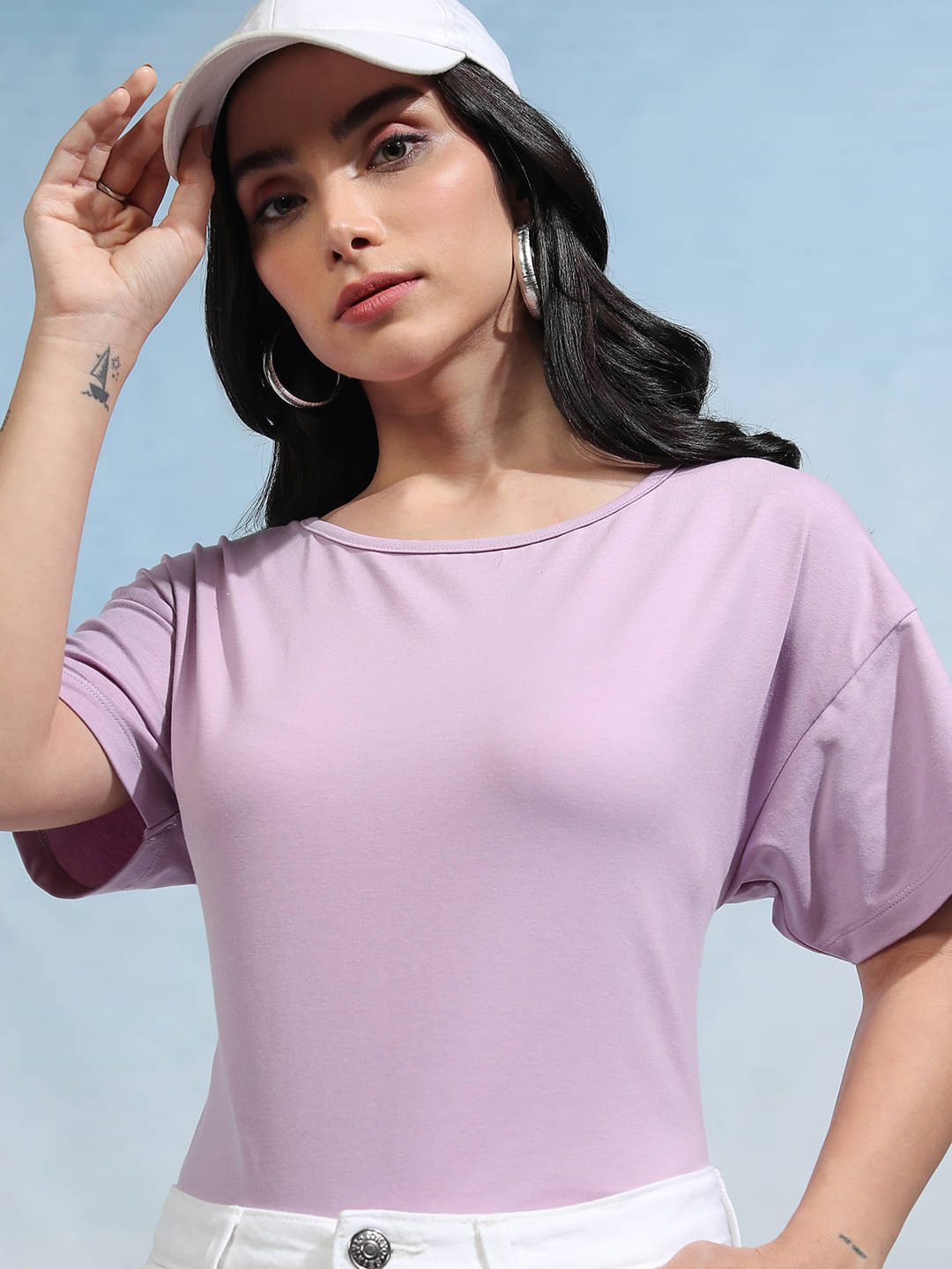     			Tokyo Talkies Women Cotton Blend Solid Regular Fit Round Neck T-Shirt ( Purple )