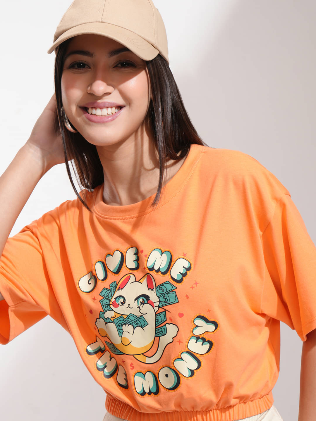     			Tokyo Talkies Women Cotton Blend Solid Regular Fit Round Neck T-Shirt ( Orange )