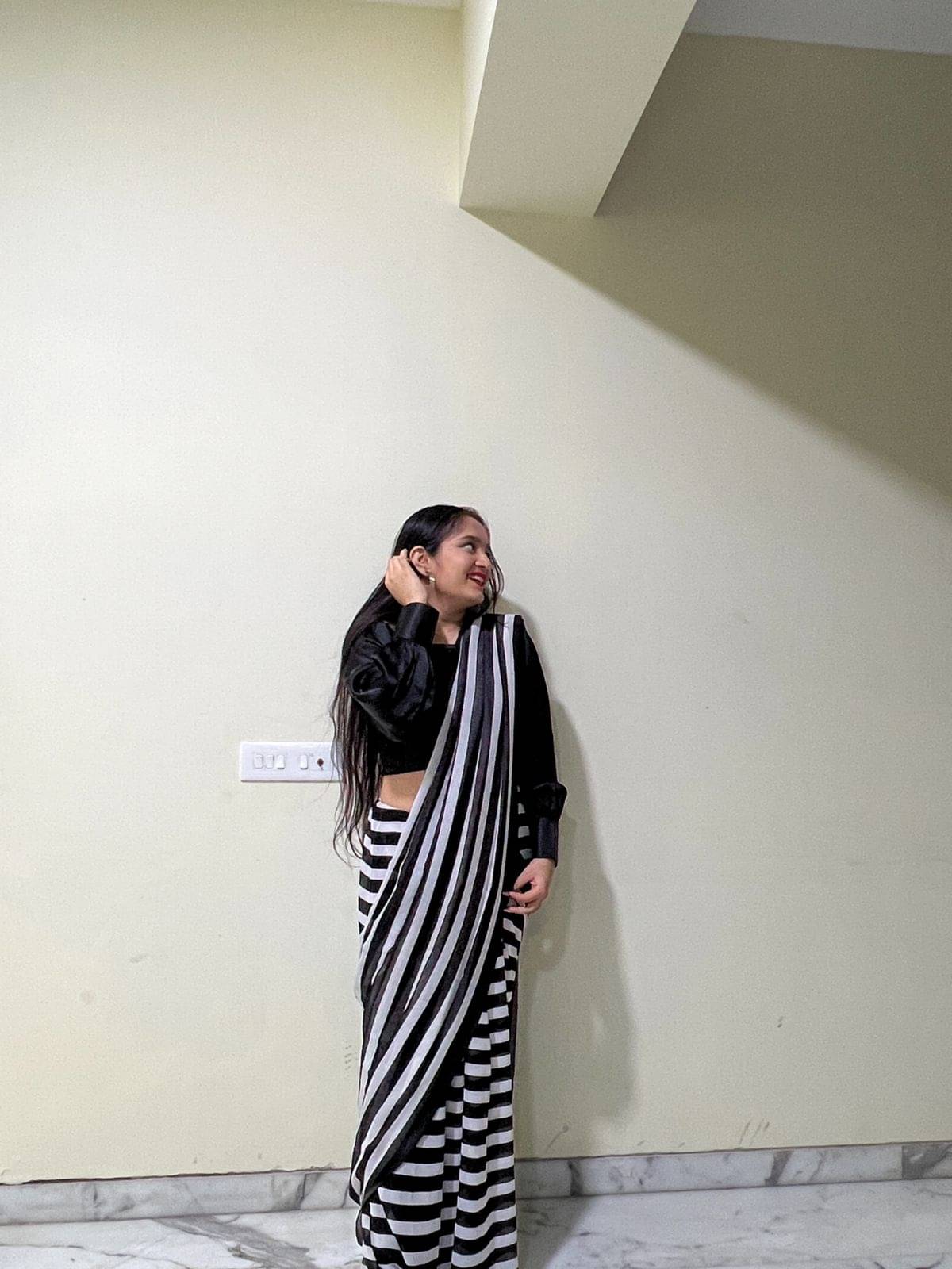 ANAND SAREES Georgette Striped Ilkal Saree With Unstitched Blouse Piece ( BLACK ) ANAND SAREES Georgette Striped Ilkal Saree With Unstitched Blouse Piece ( BLACK )