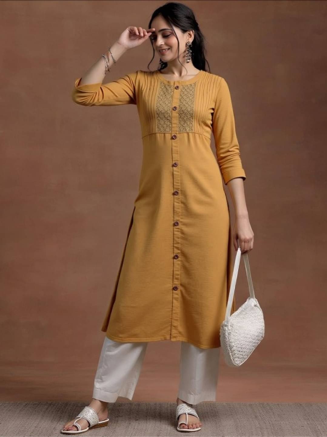 MAYKR Women Rayon Embroidered Straight Kurti ( Mustard ) MAYKR Women Rayon Embroidered Straight Kurti ( Mustard )