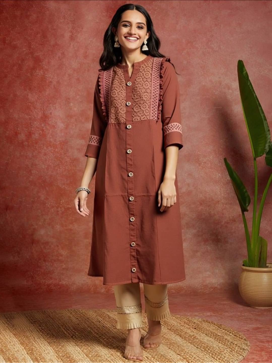 MAYKR Women Rayon Embroidered Straight Kurti ( Rust ) MAYKR Women Rayon Embroidered Straight Kurti ( Rust )