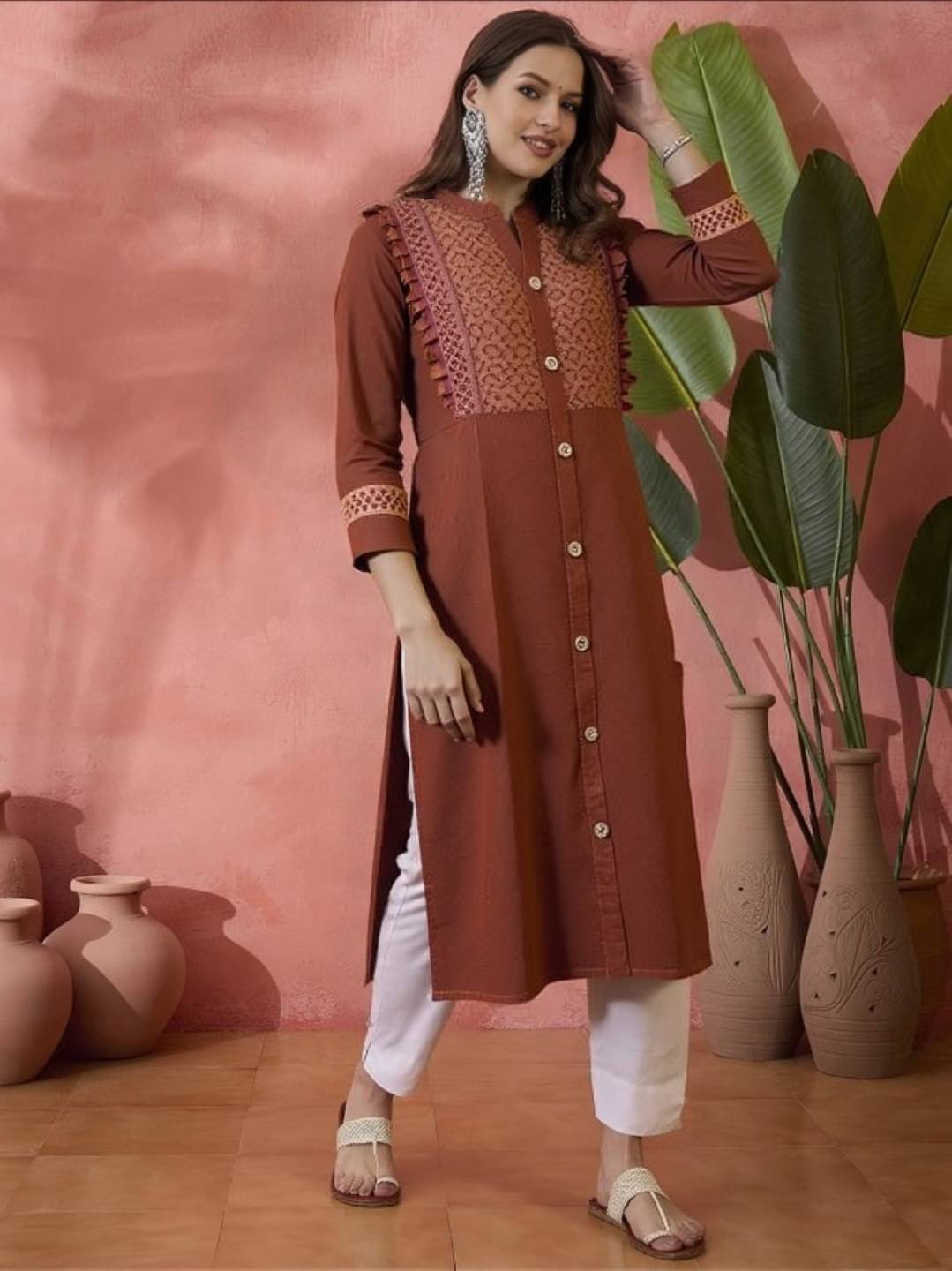     			MAYKR Women Rayon Embroidered Straight Kurti ( Rust )