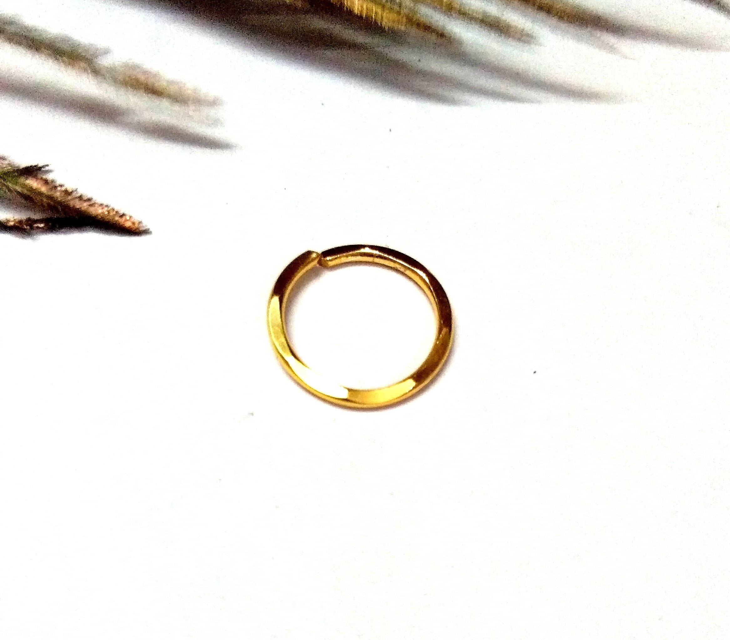     			house of common Beads Sterling Silver Plated Metal, Alloy, Brass, Tungsten Nose Ring ()