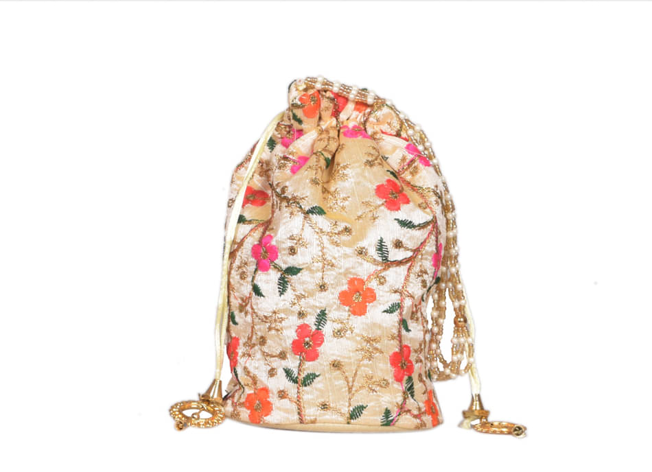     			Sunvika House Nude Silk Potli