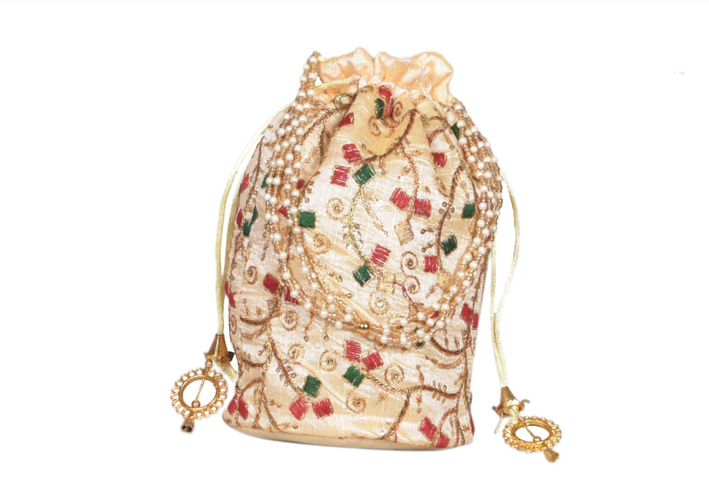     			Sunvika House Tan Silk Potli